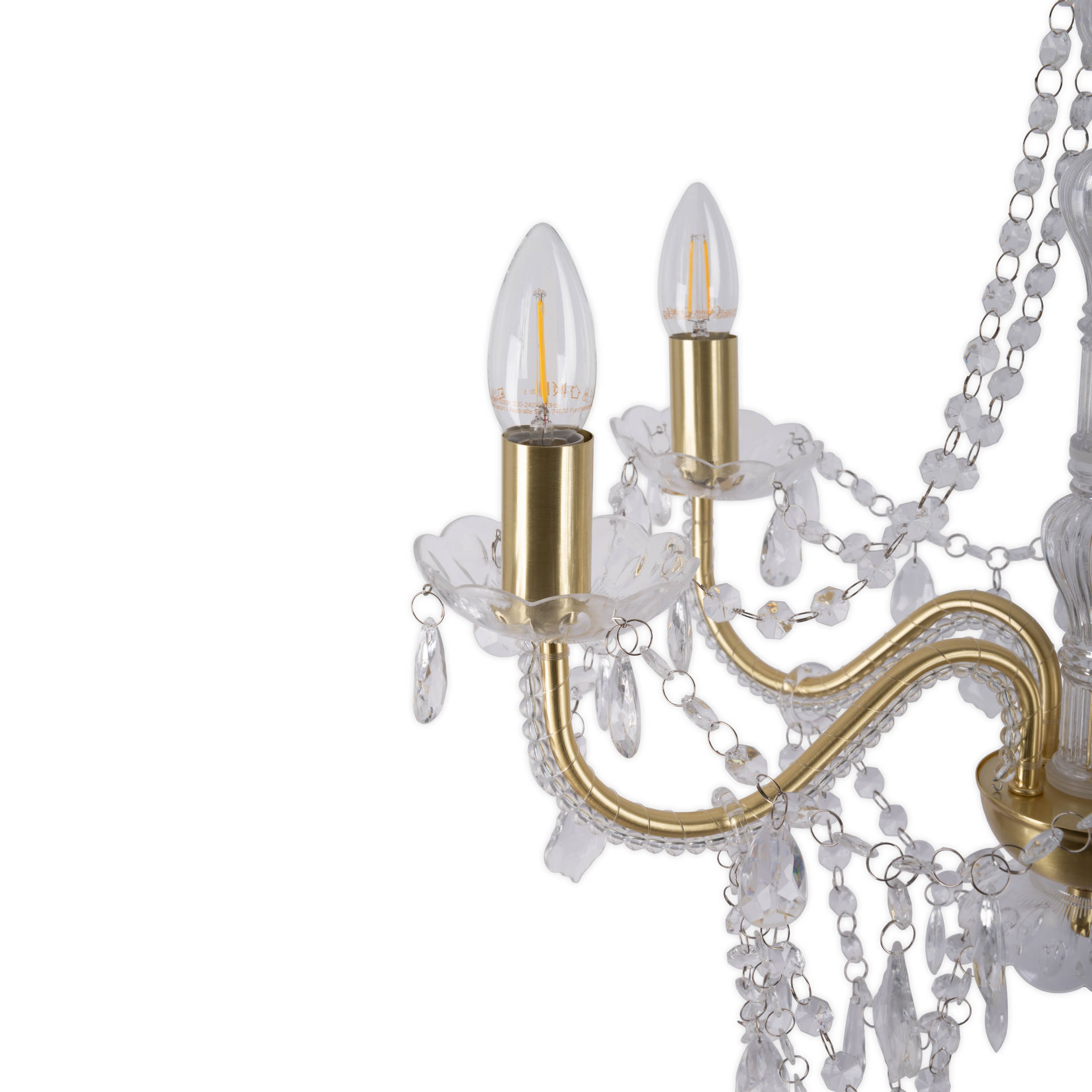Kronleuchter-Detail mit zwei brennenden Glühbirnen und Kristallsträngen. Goldakzente und klares Glas.