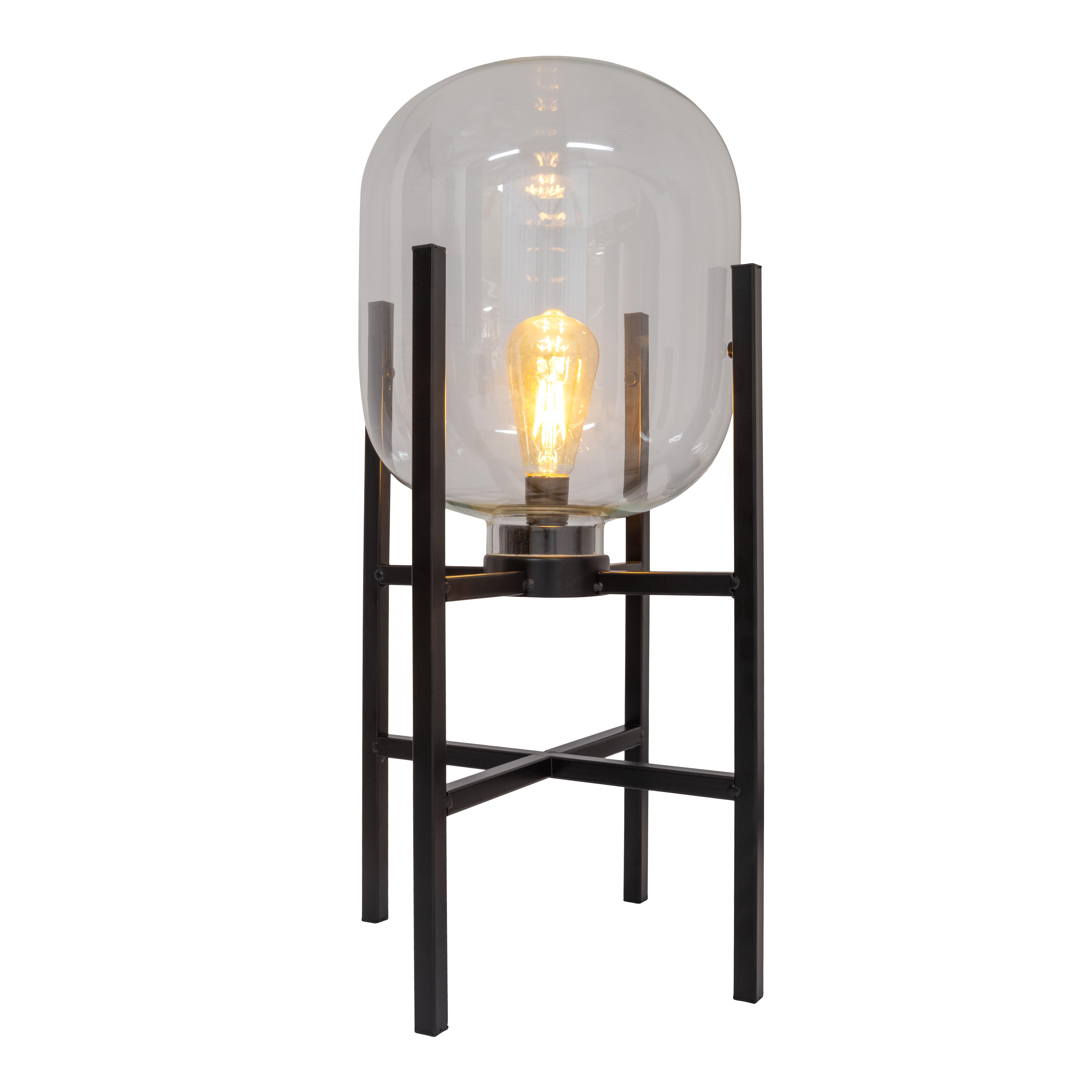 Eine Lampe mit klarer Glaskugel auf einem schwarzen Metallständer mit sichtbarer Glühbirne.