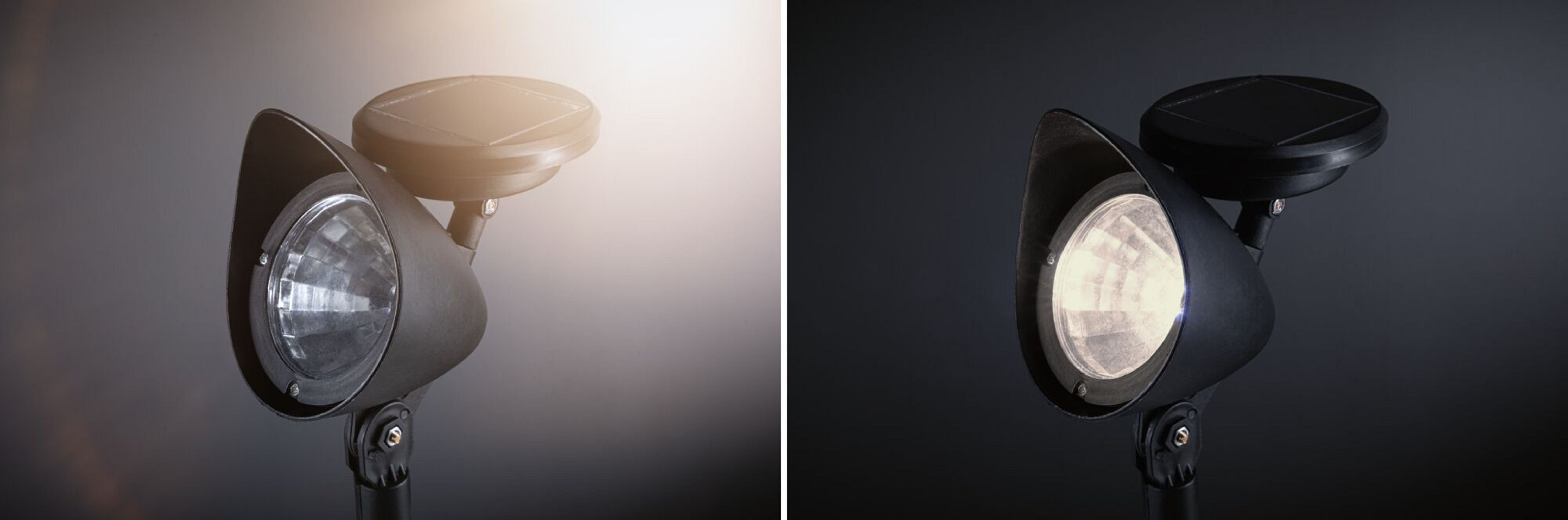 Solarbetriebene Strahler. Einer mit Licht aus, der andere mit Licht an.