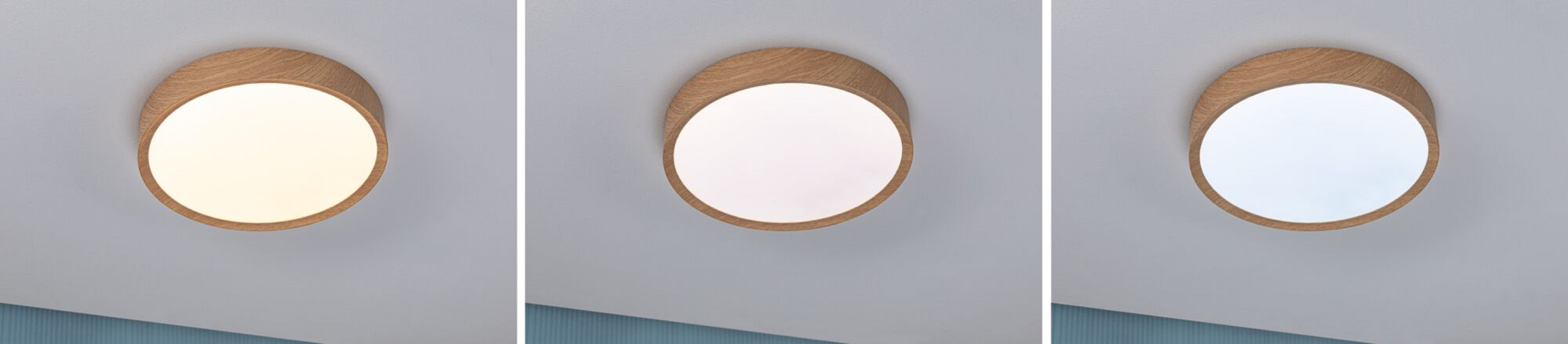 Drei Deckenleuchten mit Holzverkleidung, die jeweils eine andere Lichtfarbe ausstrahlen.