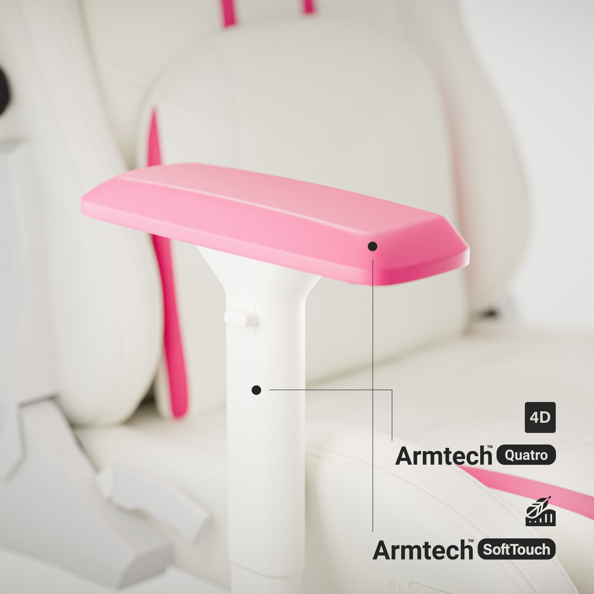 Zbliżenie białego fotela gamingowego z różowymi podłokietnikami, oznaczony jako 'Armtech Quattro' i 'Soft Touch'.