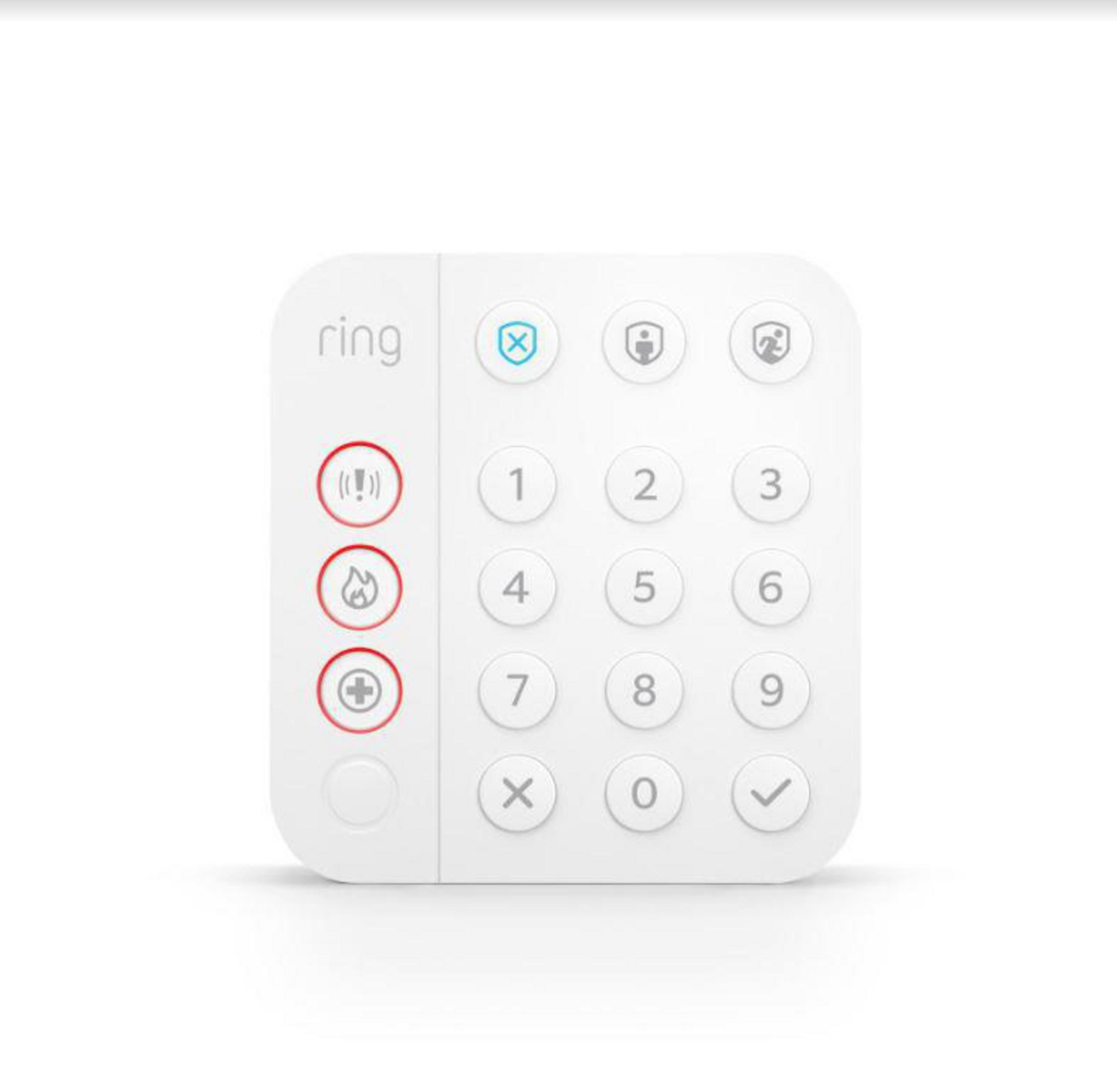 Biała klawiatura systemu bezpieczeństwa Ring z ponumerowanymi przyciskami i kilkoma klawiszami funkcyjnymi.