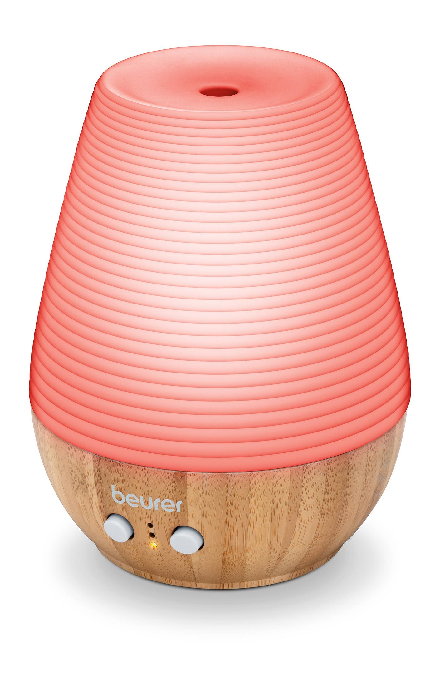 Aromadiffusor, Holzsockel mit rot beleuchteter Oberseite. Zwei Knöpfe, und Beurer-Logo.