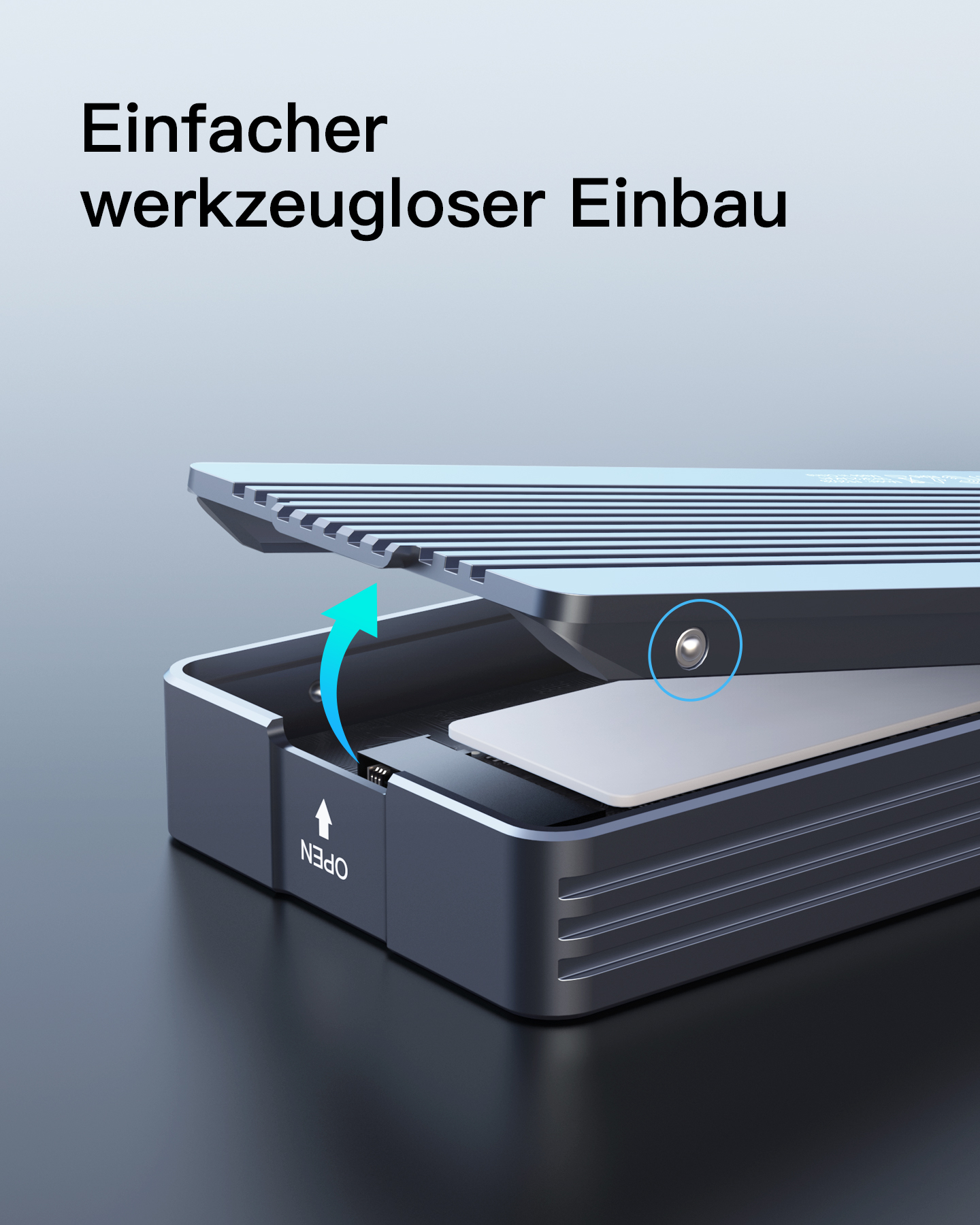 Ein schwarz-graues Gerät mit dem Text 'OPEN' und einem Pfeil. Die obere Platte ist offen.