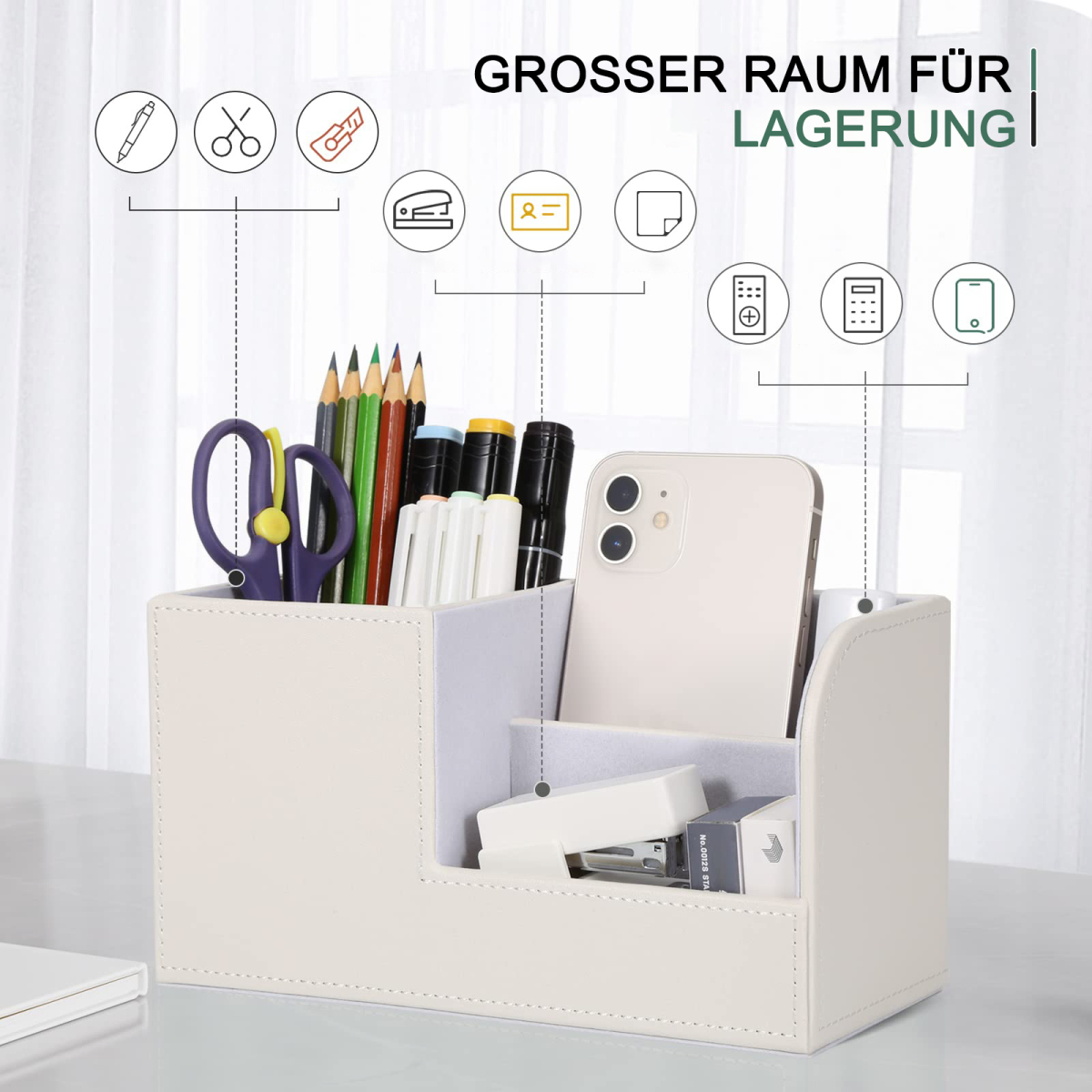 Cremefarbener Schreibtisch-Organizer mit verschiedenen Gegenständen: Stiften, Schere, Telefon, Tacker und Radiergummi.