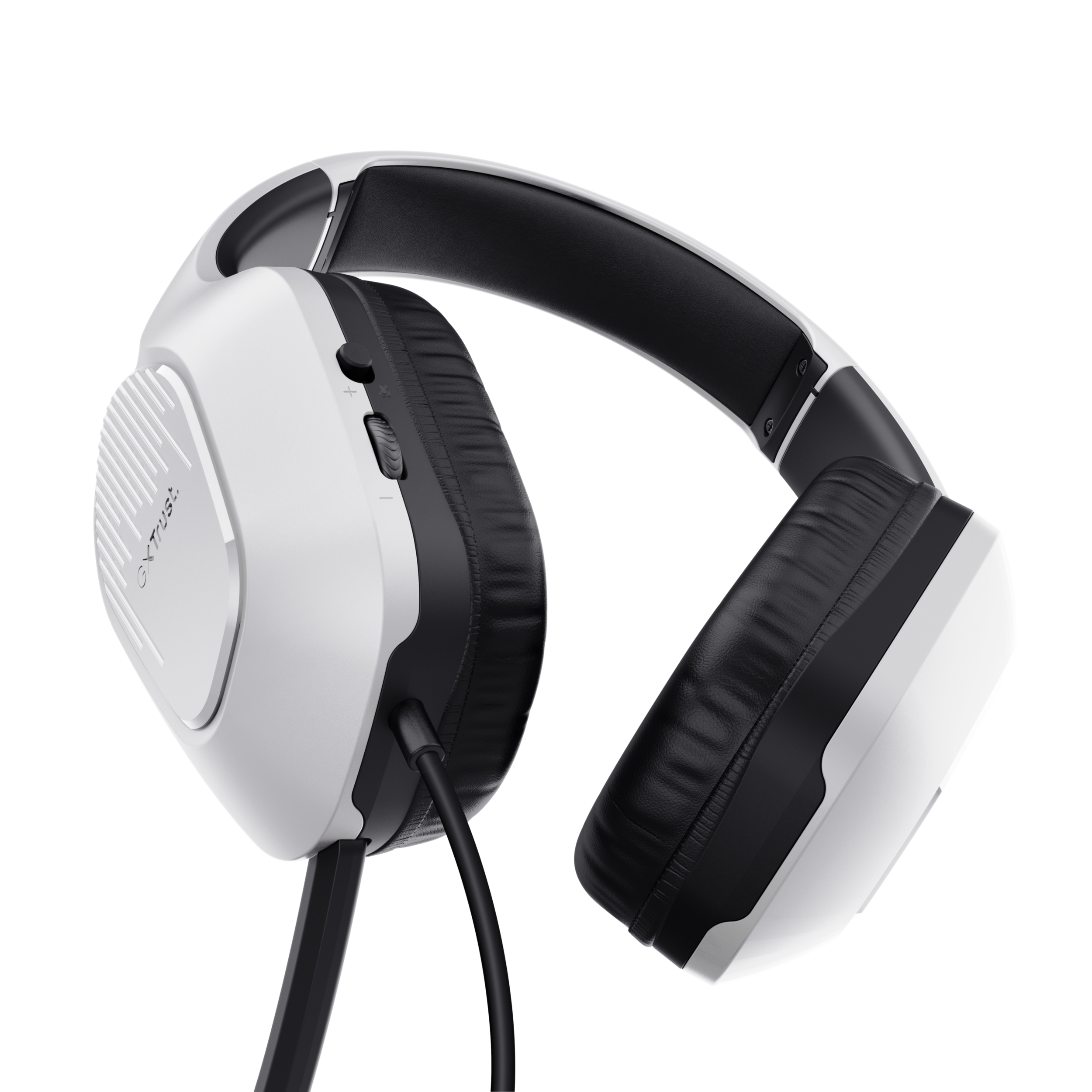 Białe i czarne słuchawki z przewodem, na czarnym tle, widok z boku.