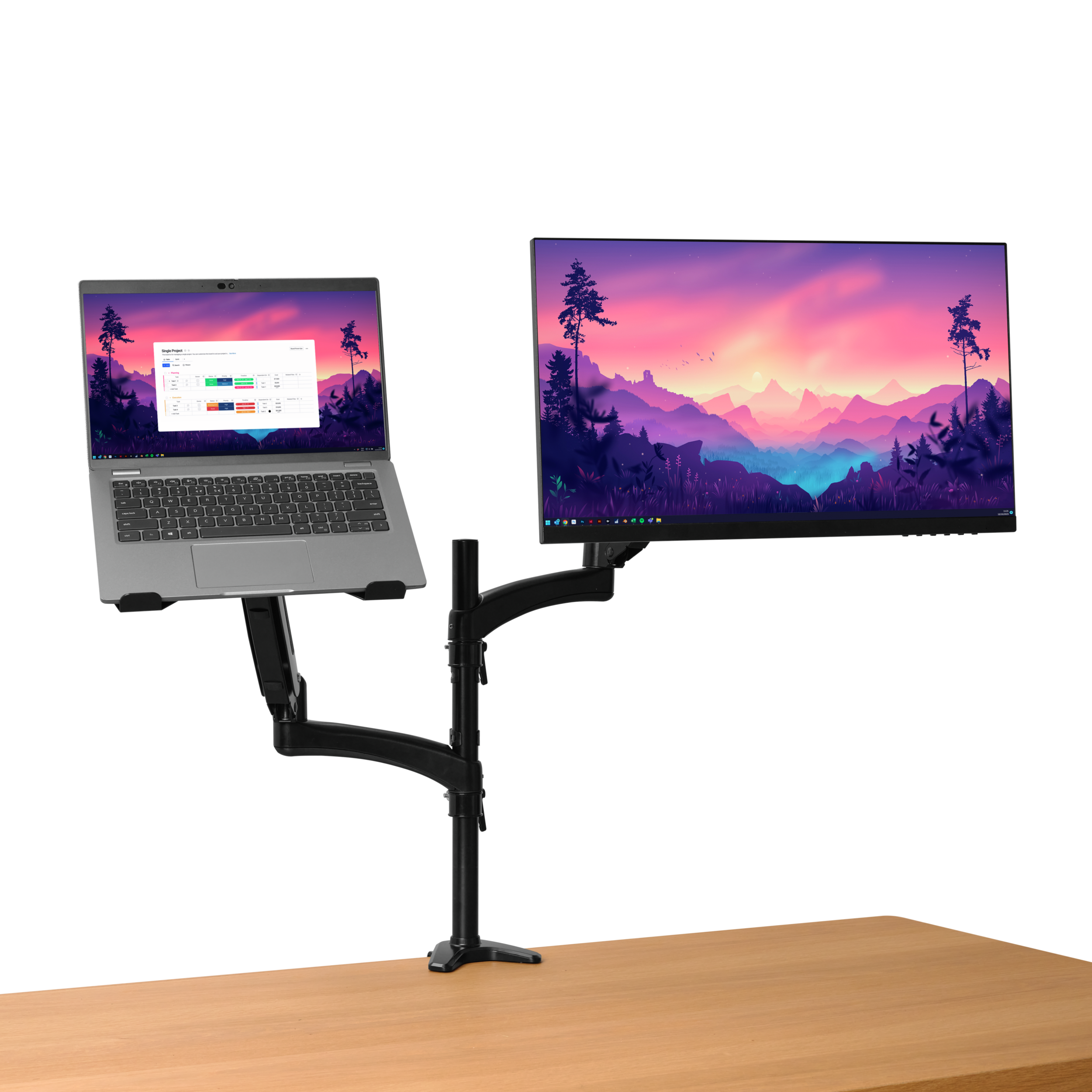 Konfiguracja laptopa i monitora na drewnianym biurku. Laptop jest otwarty. Monitor wyświetla krajobraz.