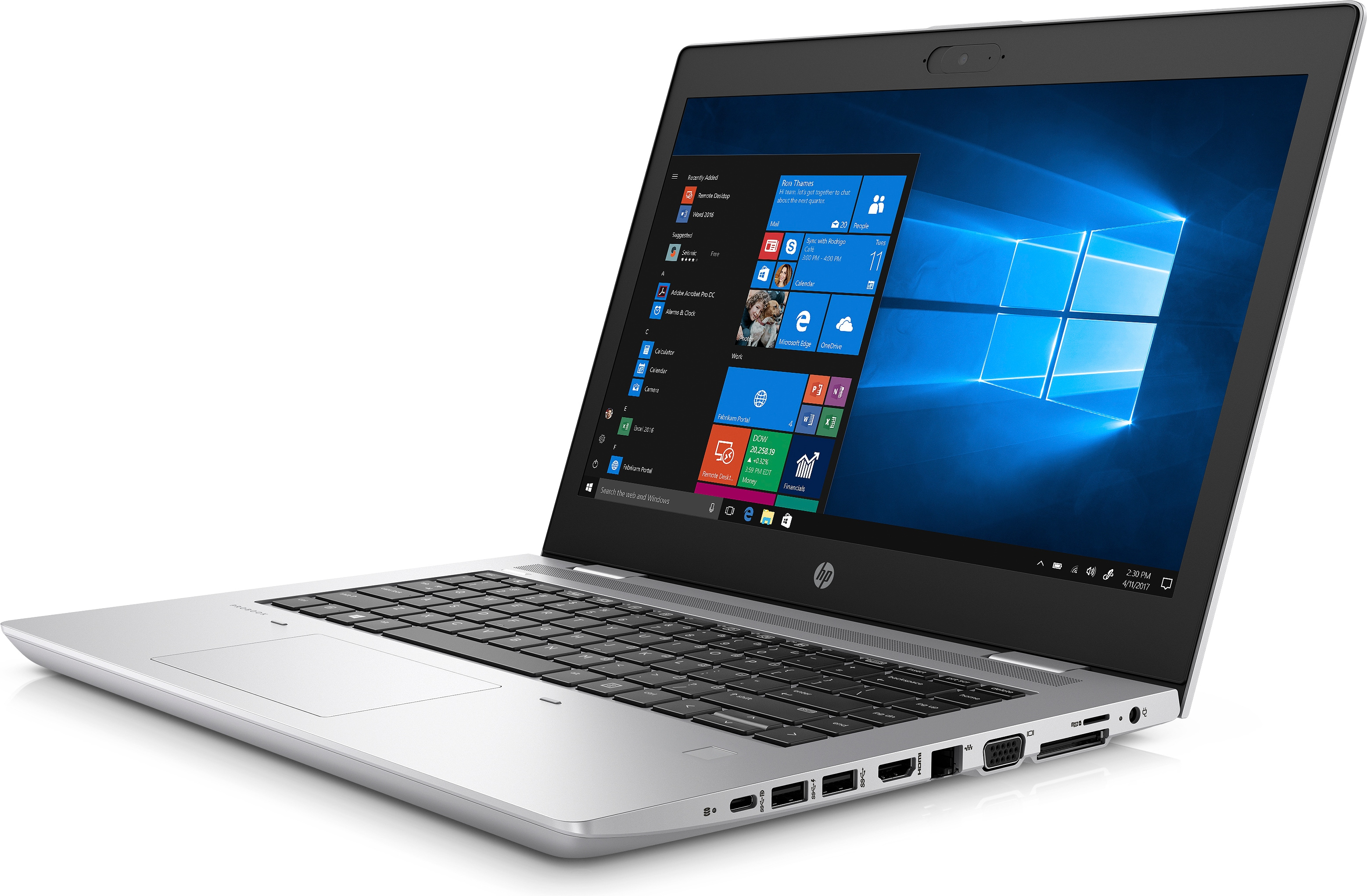 Silver laptop, open, Windows interface on screen, on a white background. Angled view.