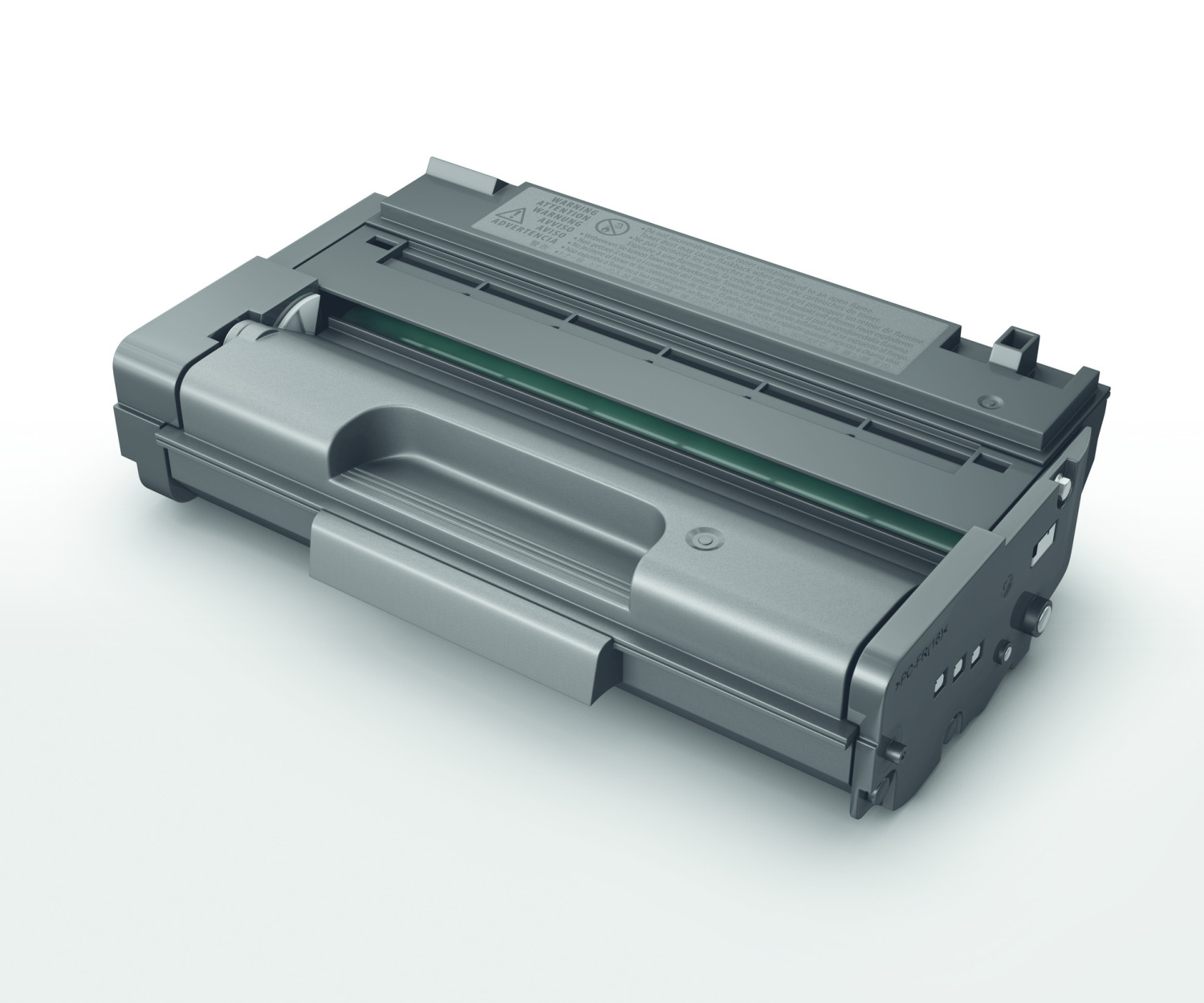 Una cartuccia toner grigia su una superficie bianca. La parte superiore ha etichette di avvertimento.