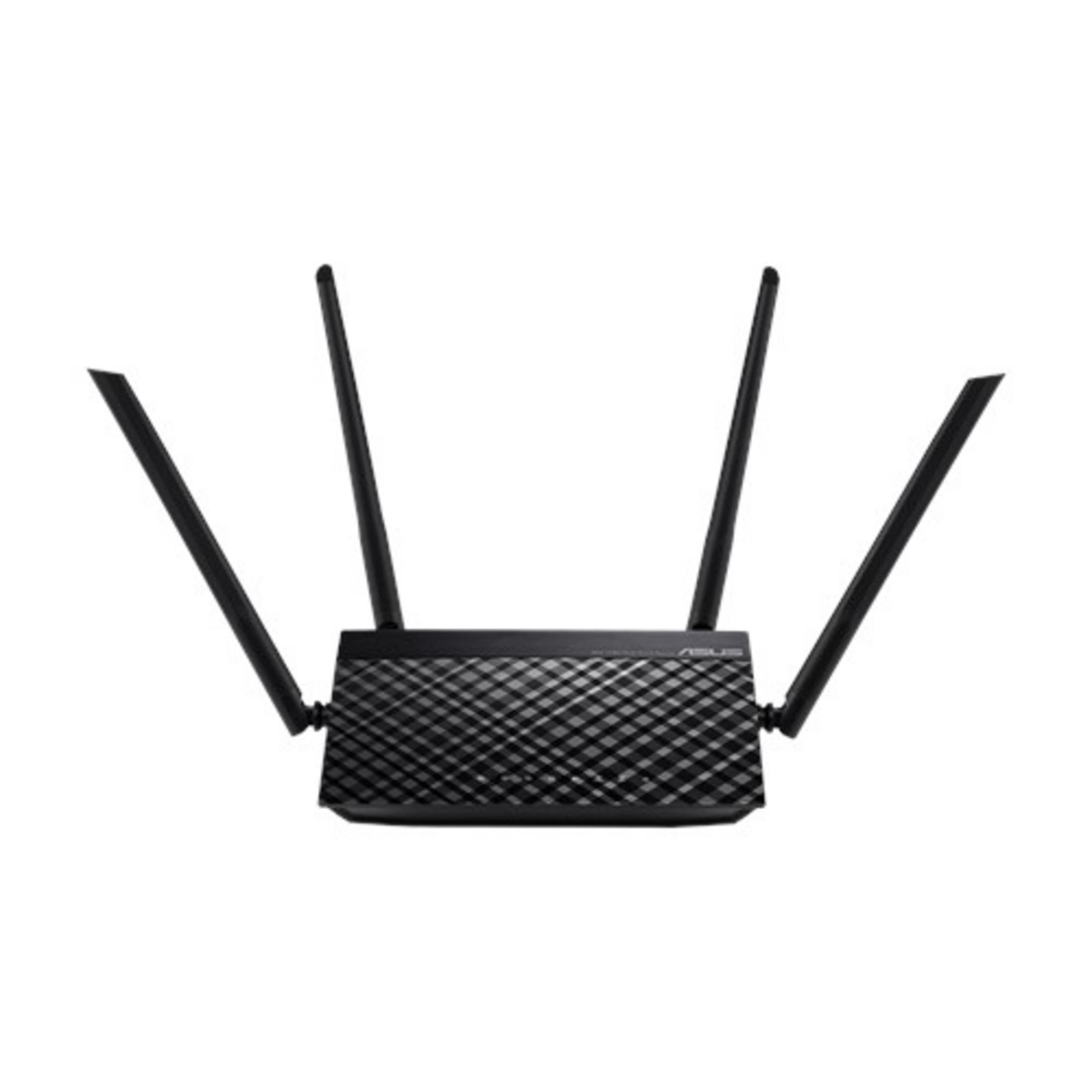 Router ASUS z czterema antenami na białym tle, widziany z góry.
