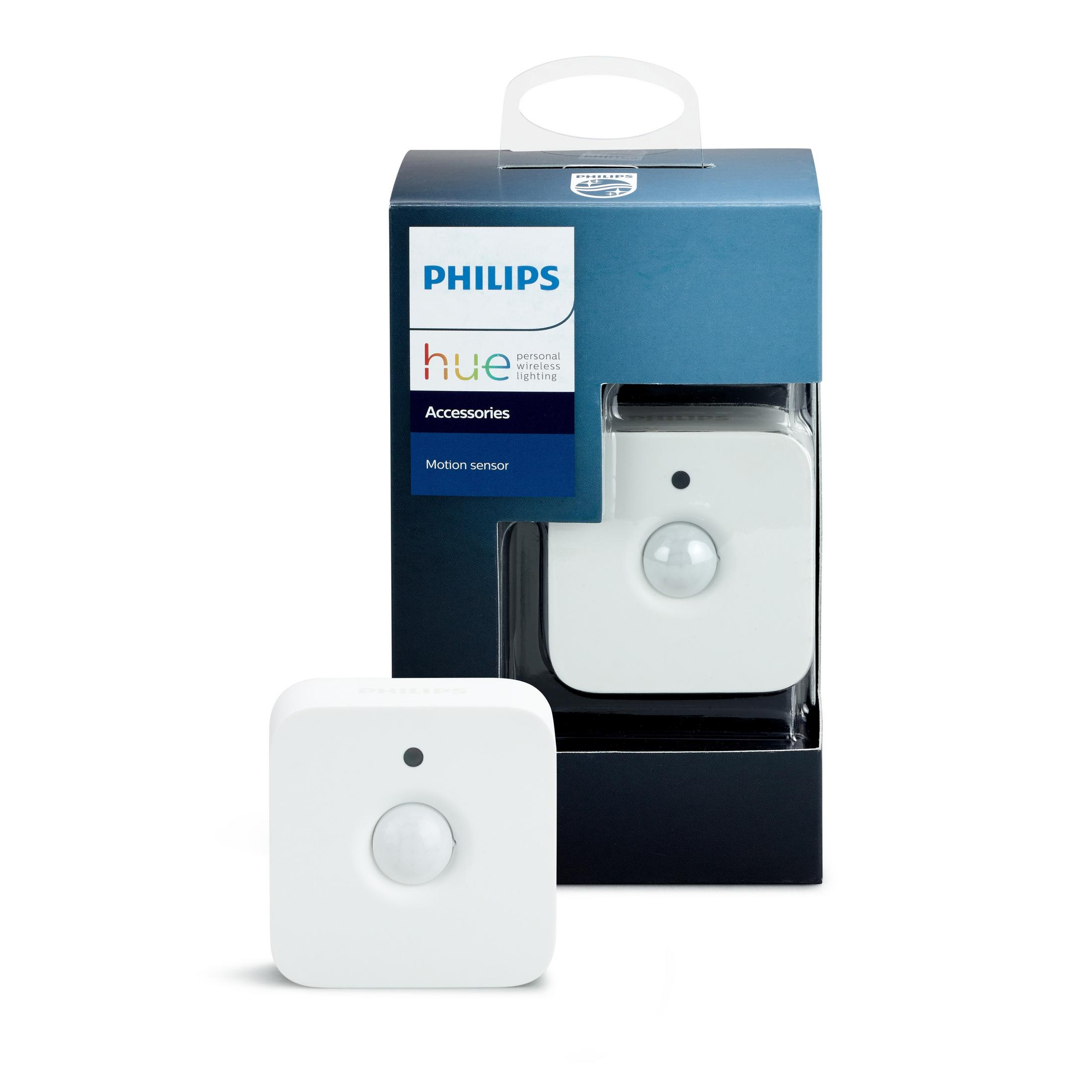Biały czujnik ruchu Philips Hue w pudełku i poza nim.