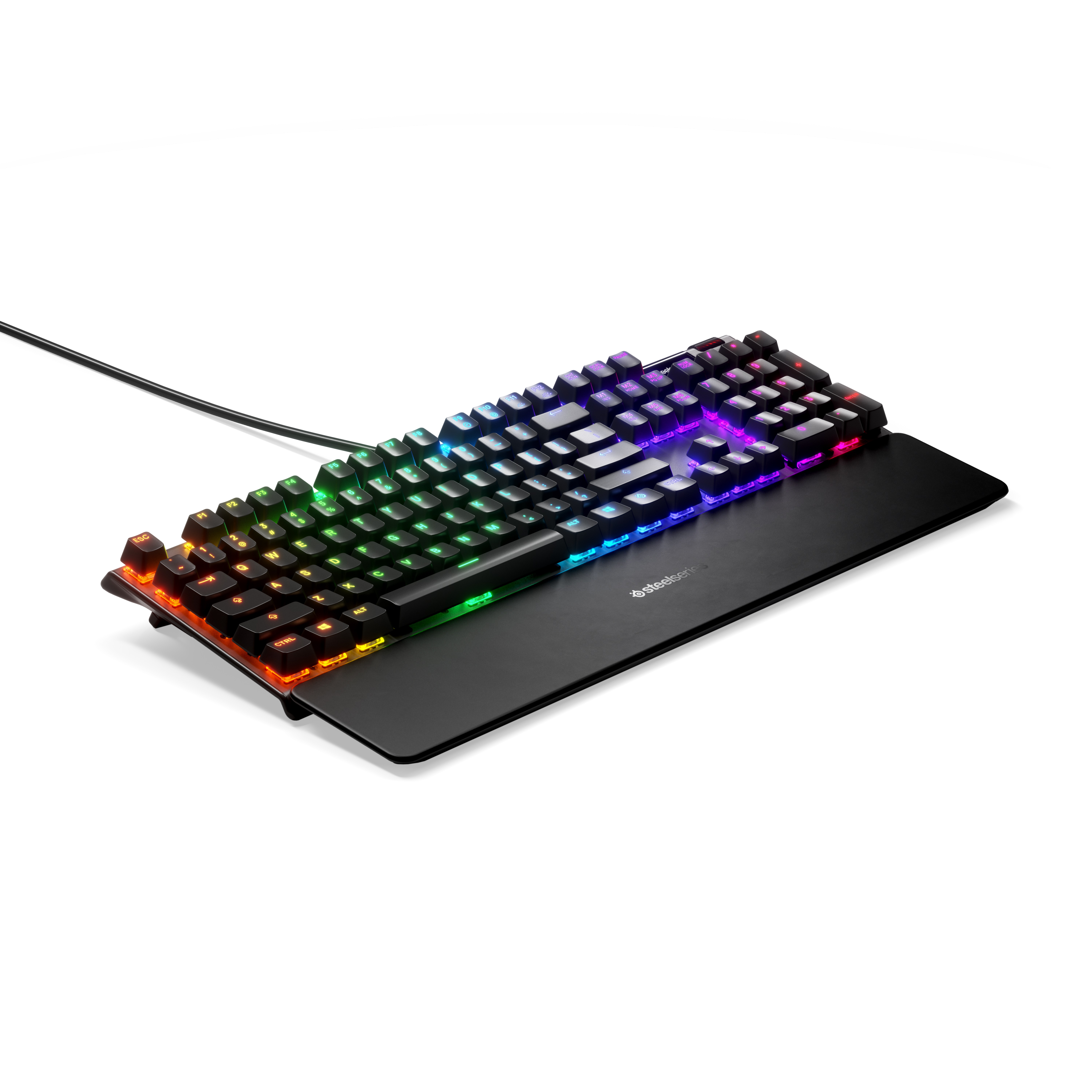 Una tastiera da gioco retroilluminata a colori arcobaleno su un poggiapolsi nero.