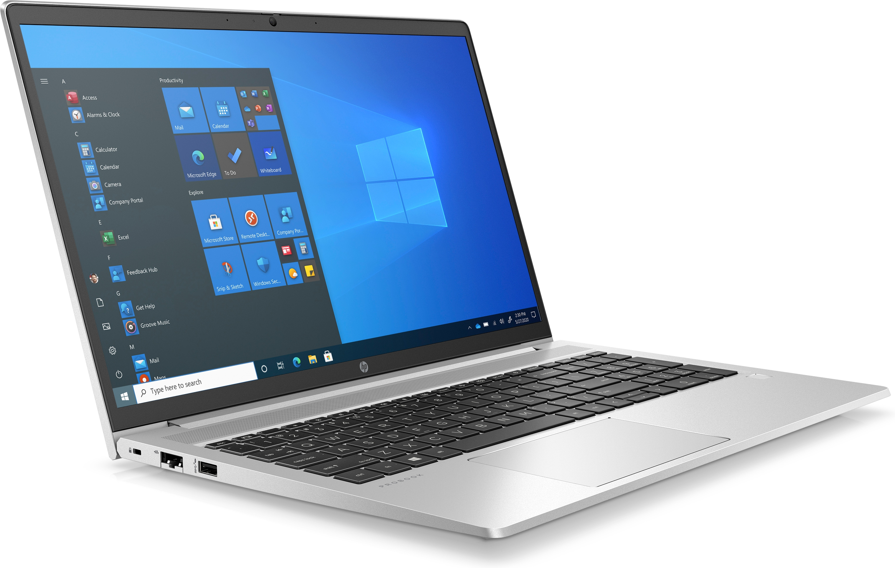 Silberner Laptop, der auf einem weißen Tisch geöffnet ist und die Windows-Oberfläche zeigt.