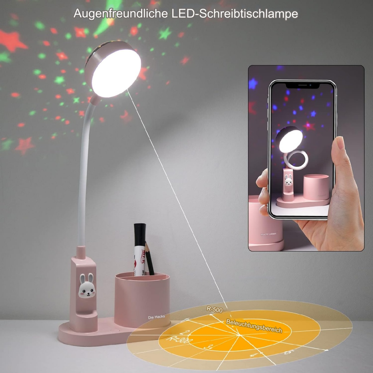 Rosa Schreibtischlampe mit Hasen-Design, die Sterne projiziert. Es gibt auch ein Telefon mit ähnlichem Bild.