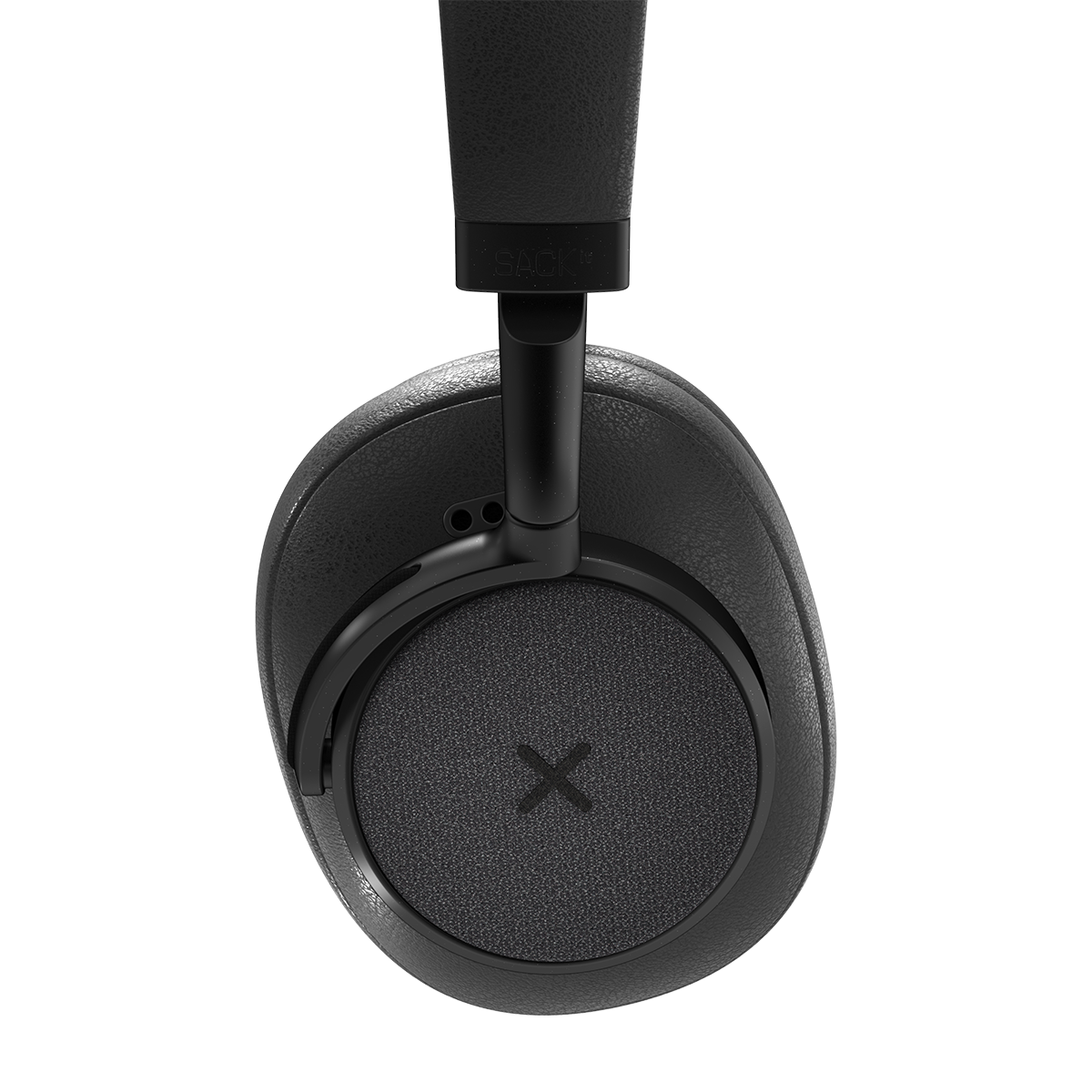 Schwarze kabellose Over-Ear-Kopfhörer. Die Ohrmuscheln sind kreisförmig mit einem 'X' darauf. Schwarzer Hintergrund.