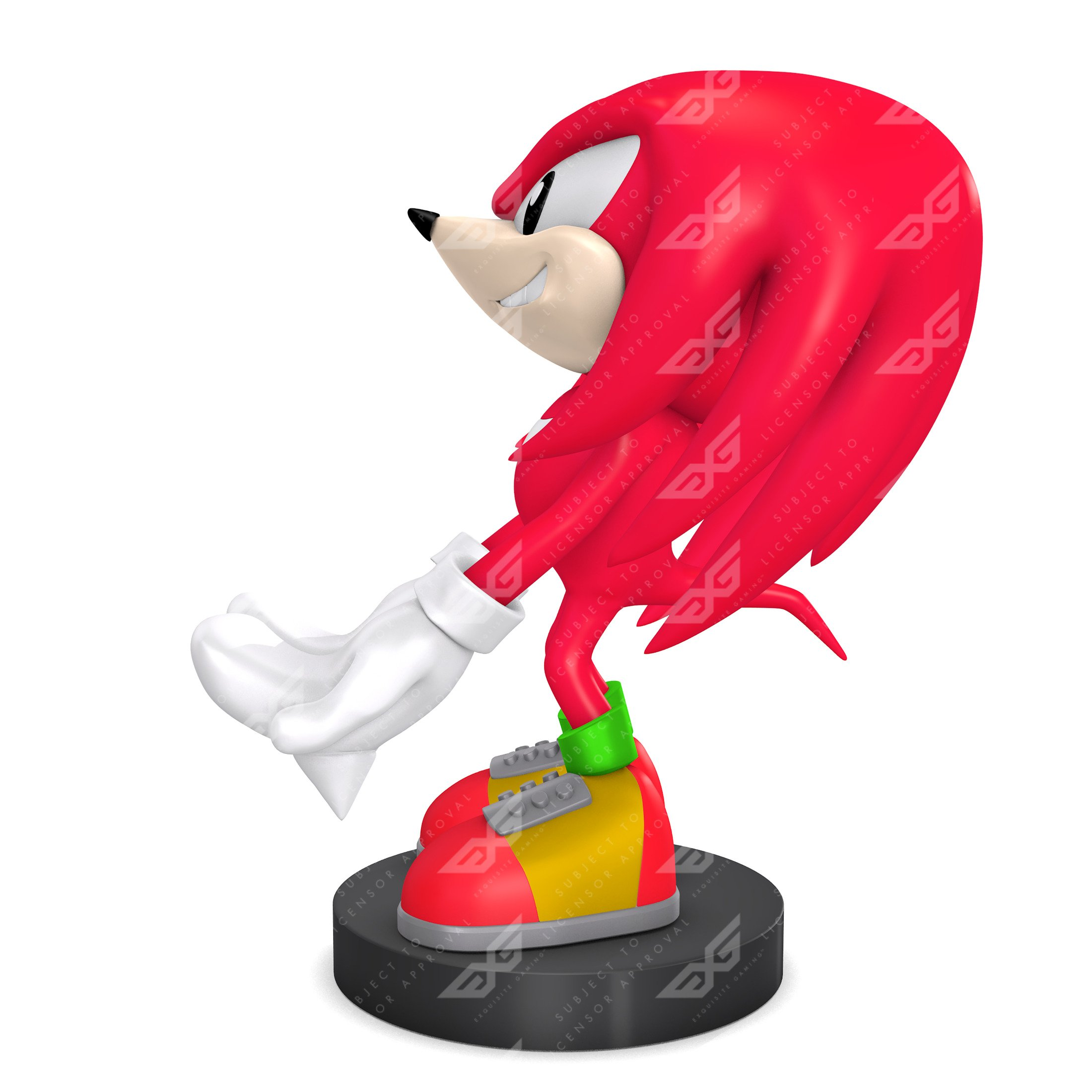 Una statuetta di Knuckles, in posa dinamica, su base nera, con sfondo bianco.