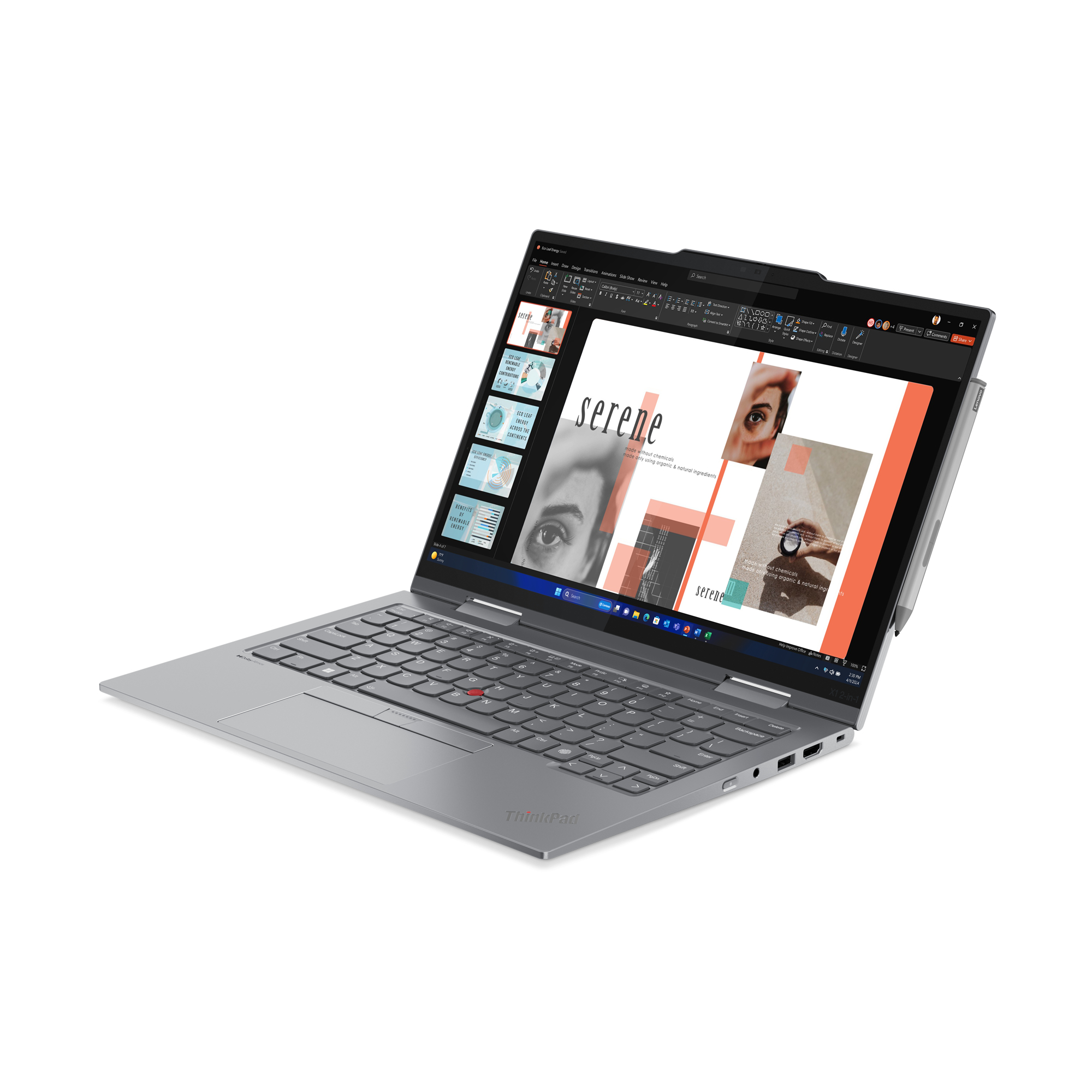 Srebrny laptop ThinkPad w użyciu. Ekran pokazuje prezentację. Klawiatura widoczna.