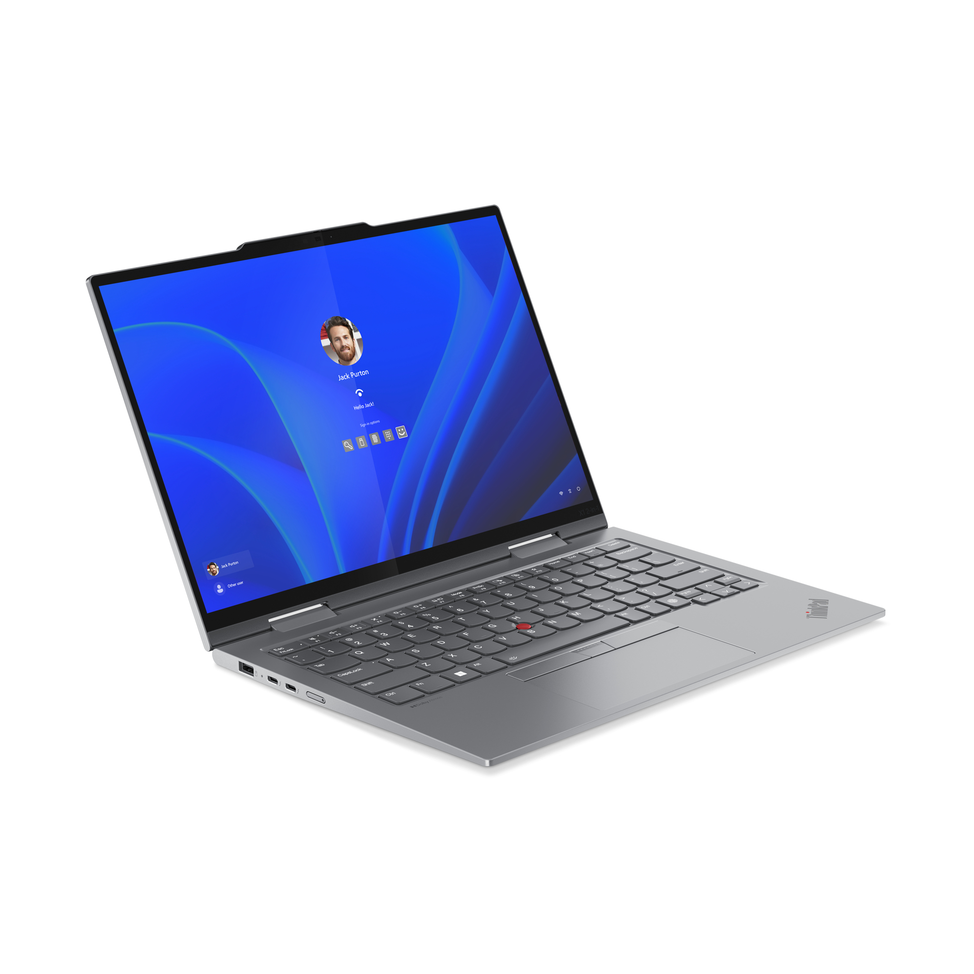 Srebrny laptop z niebieskim ekranem pokazującym zdjęcie profilowe.