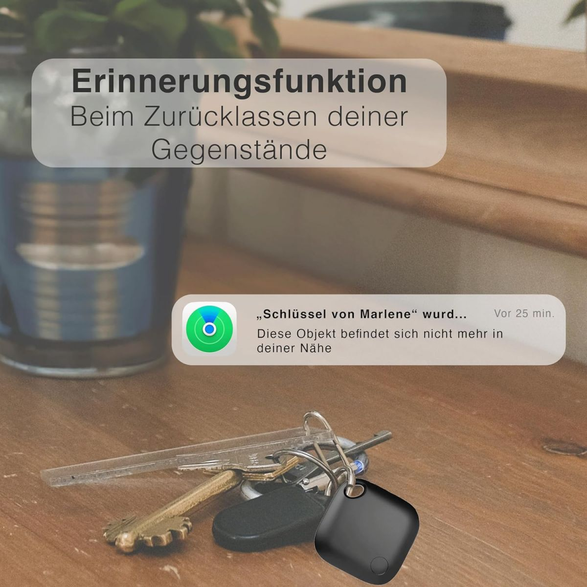Ein Schlüsselbund mit Schlüsseln und einem schwarzen Tracker. Benachrichtigung zeigt Schlüssel verloren.