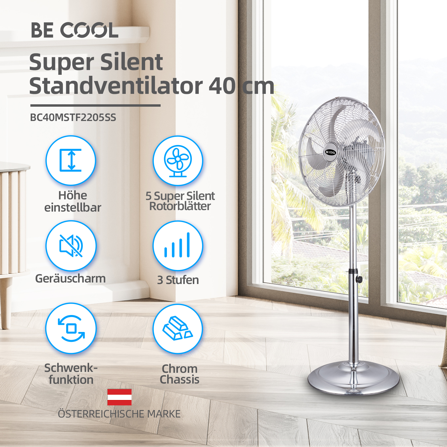 Silberner Standventilator mit Text und Symbolen. Fenster im Hintergrund.