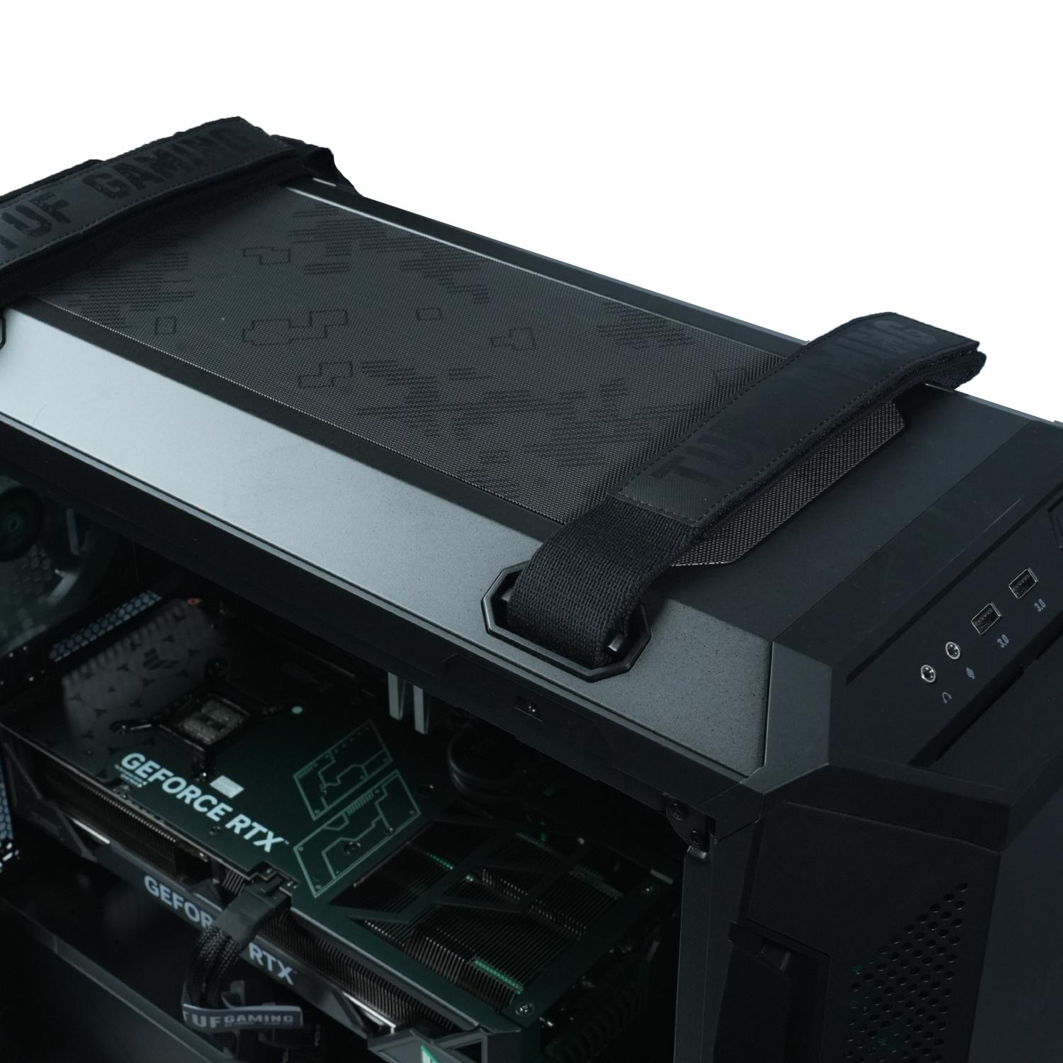 Una caja de computadora con un asa superior negra y un panel lateral transparente que muestra los componentes internos.