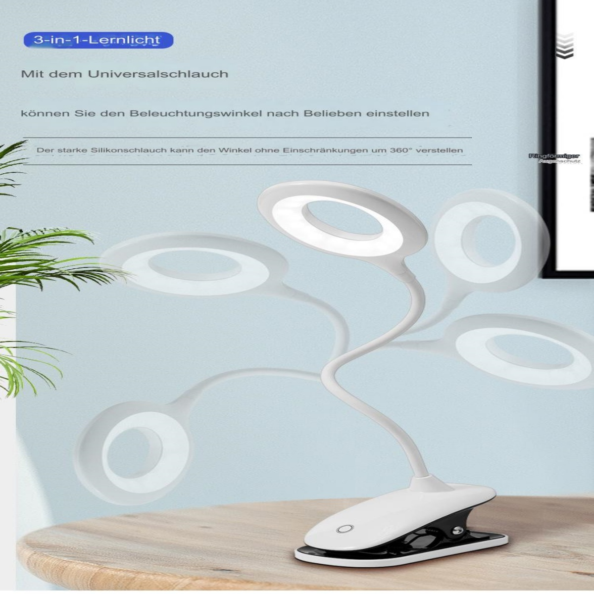 Weiße Schreibtischlampe mit flexiblem Hals, mehreren Lichtringen und schwarzem Sockel.