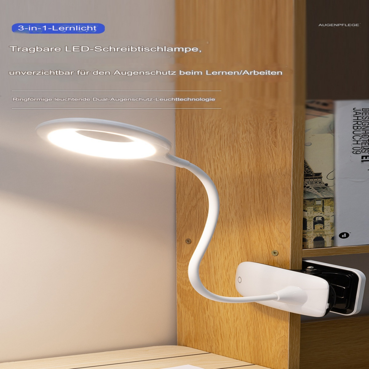 Eine weiße und graue Schreibtischlampe mit flexiblem Hals, an einer Holzoberfläche befestigt.