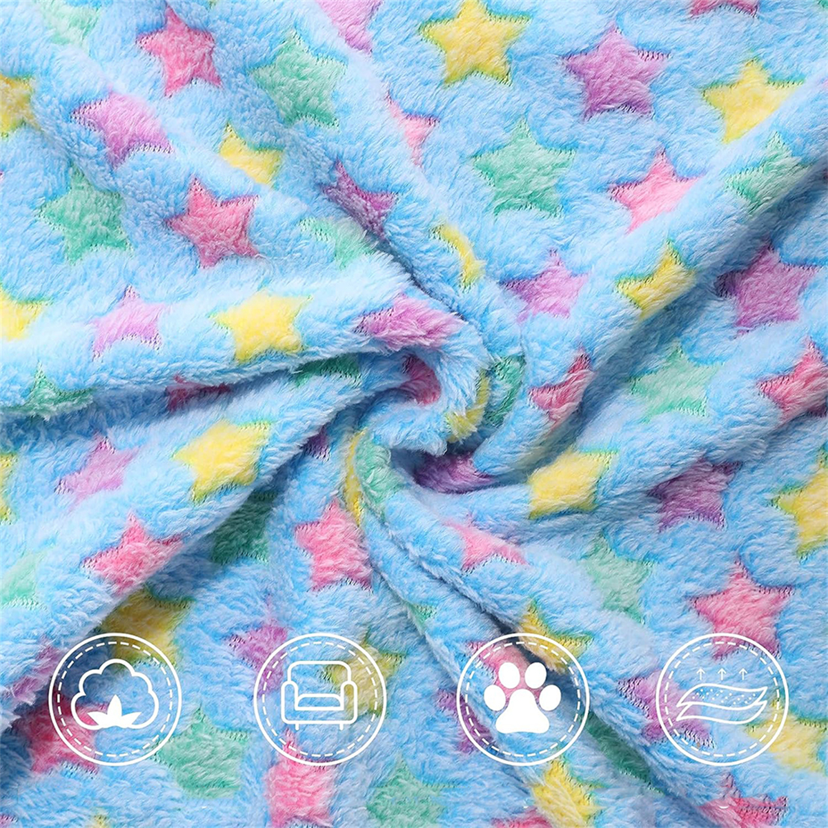 Nahaufnahme einer blauen Decke mit Sternmustern in verschiedenen Farben und Icons.
