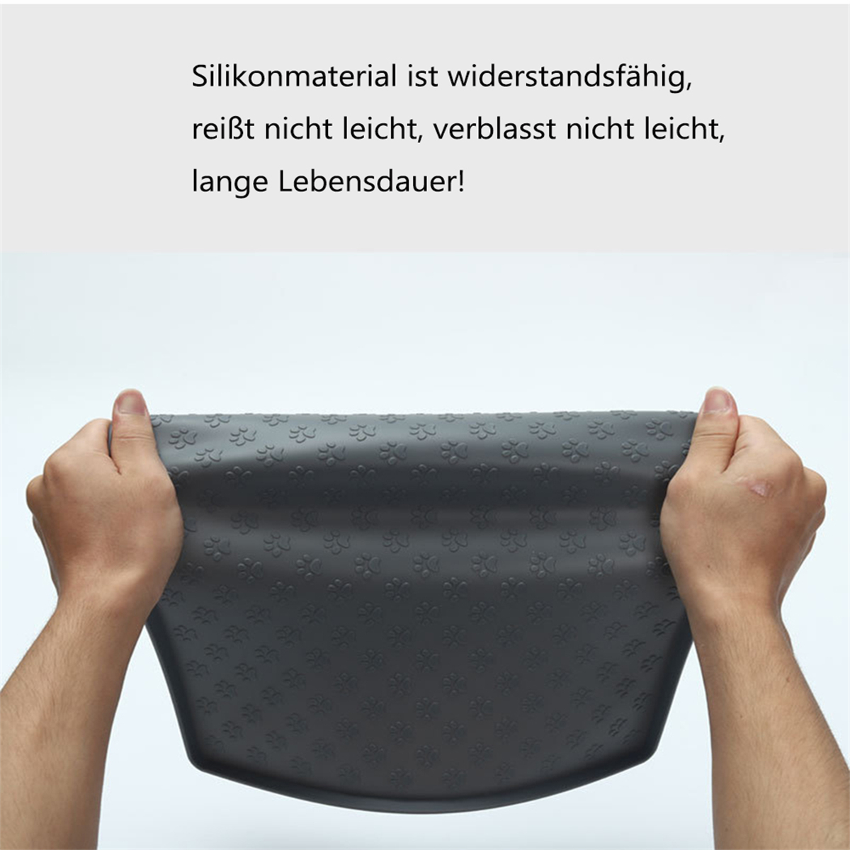 Hände halten eine graue Silikonmatte mit Blumeneindrücken. Text: Silikonmaterial ist haltbar, reißt nicht, lange Lebensdauer!