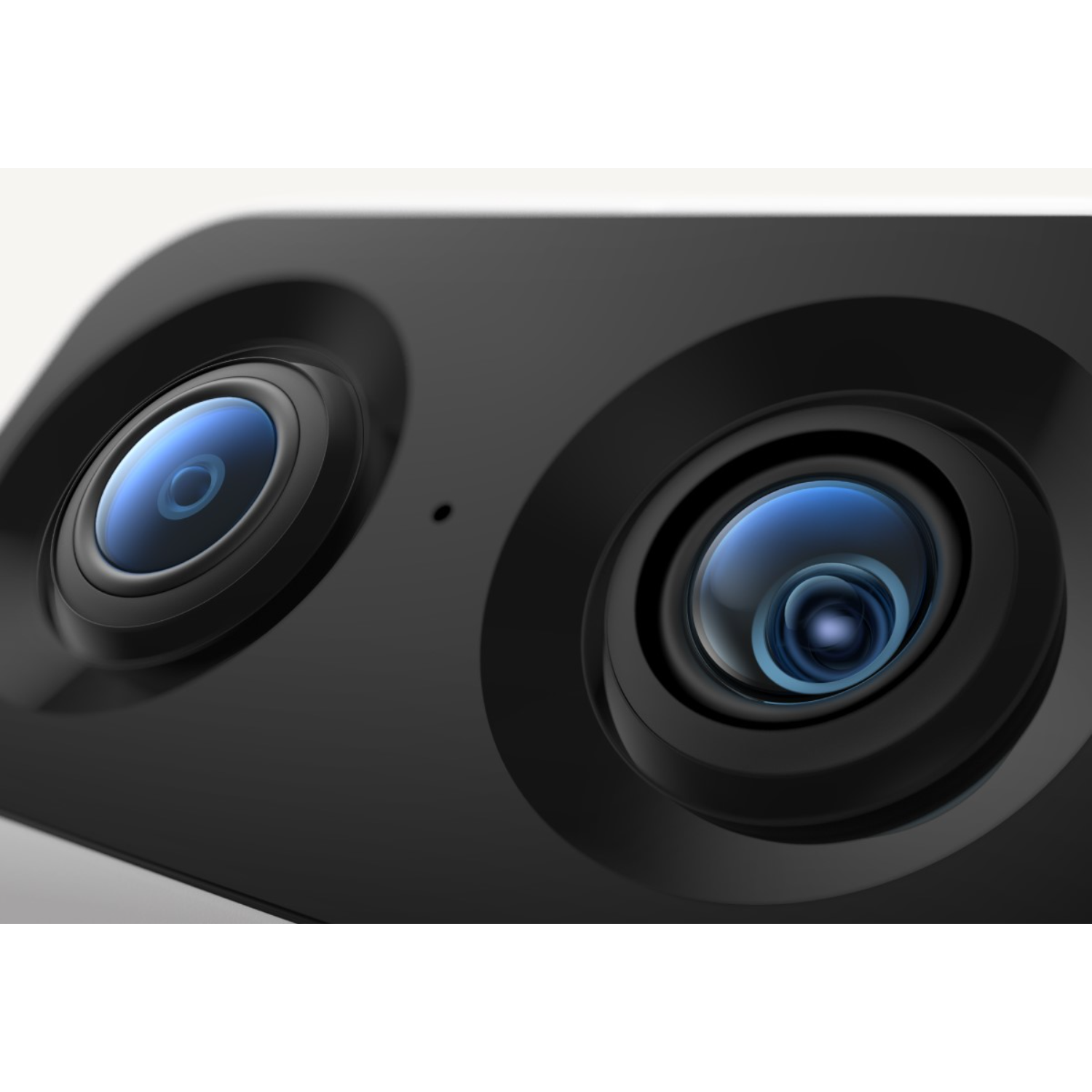 Zbliżenie czarnego urządzenia z dwoma obiektywami, odbijającymi niebieskie światło.