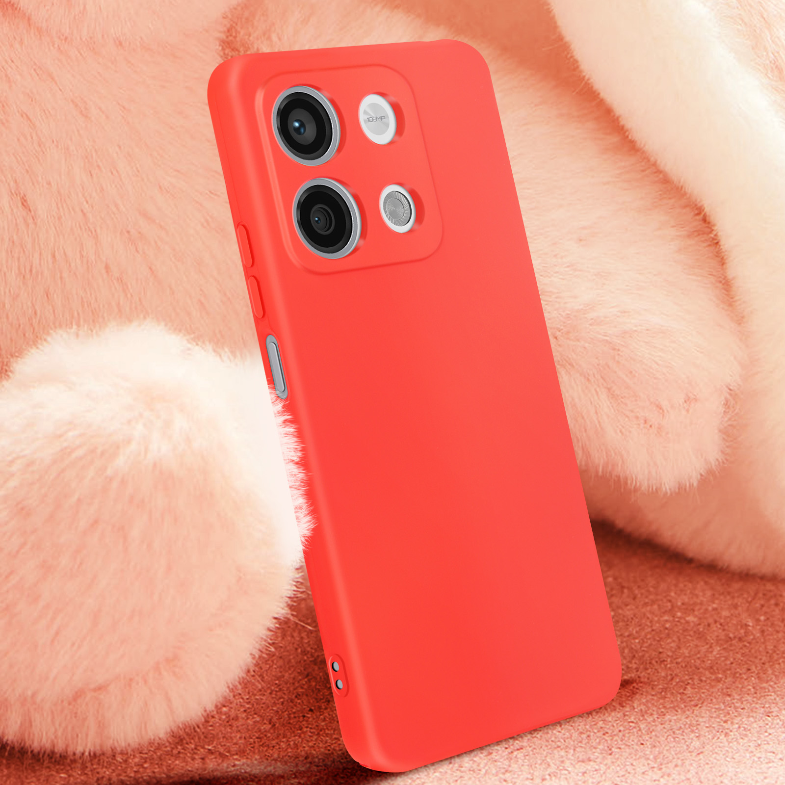 Custodia per telefono rossa su sfondo rosa, con configurazione della fotocamera.