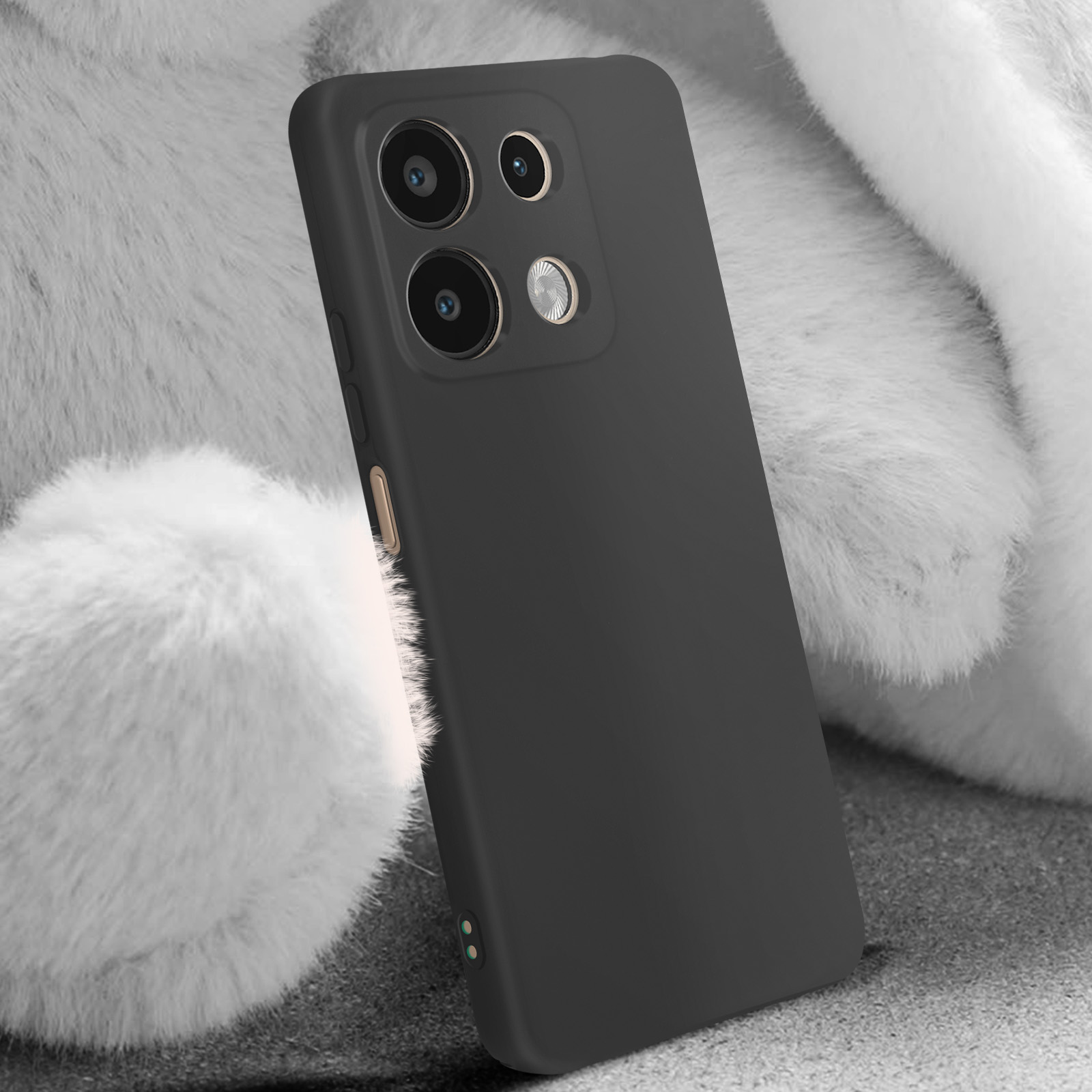 Custodia nera per telefono. Quattro obiettivi. Sfondo grigio. Peluche bianco sfocato sullo sfondo.