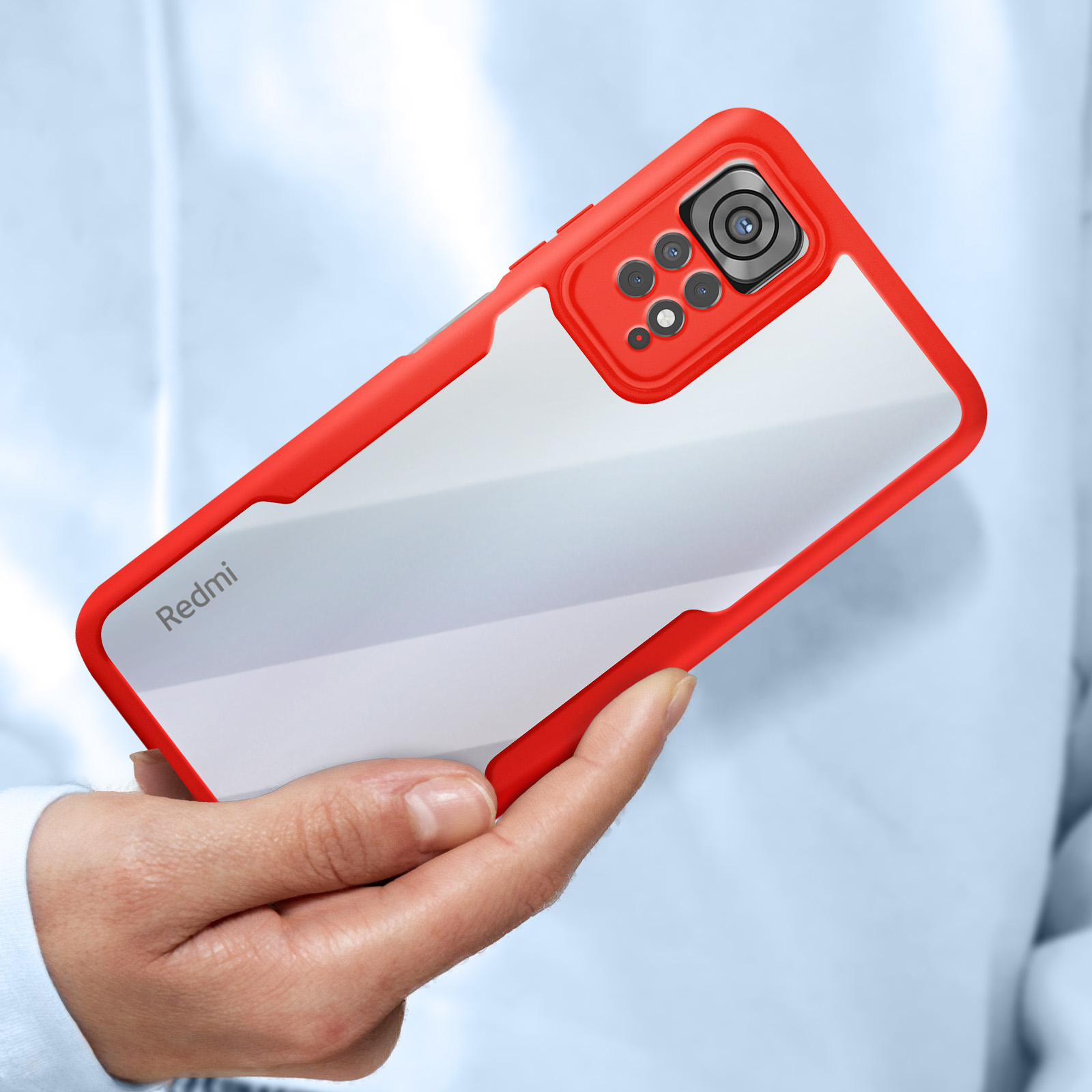 Custodia per telefono rossa con retro trasparente. Una mano tiene la custodia. La custodia ha un bordo rosso e un ritaglio per la fotocamera.