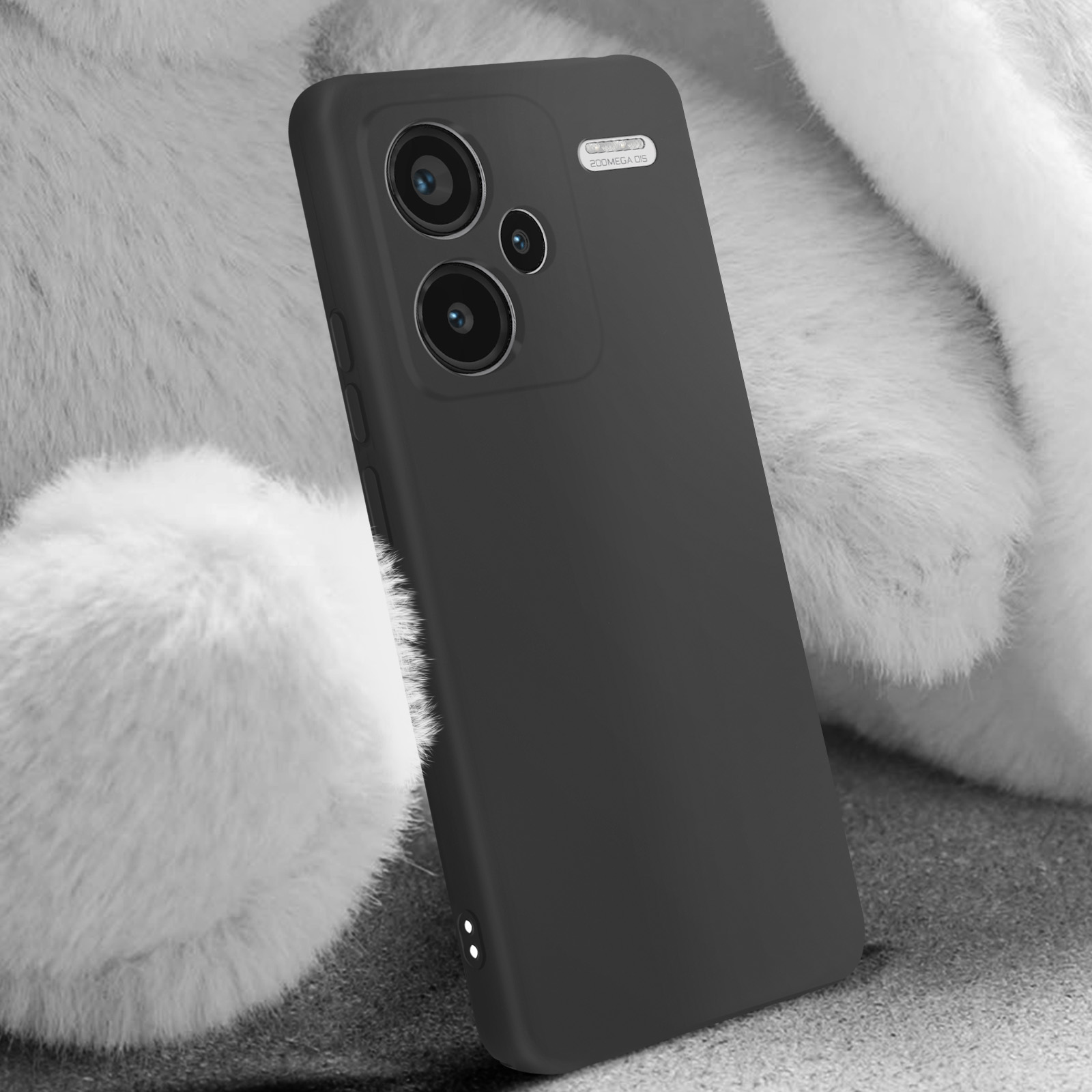 Custodia nera per telefono con ritagli per fotocamera. Sfondo bianco e soffice.