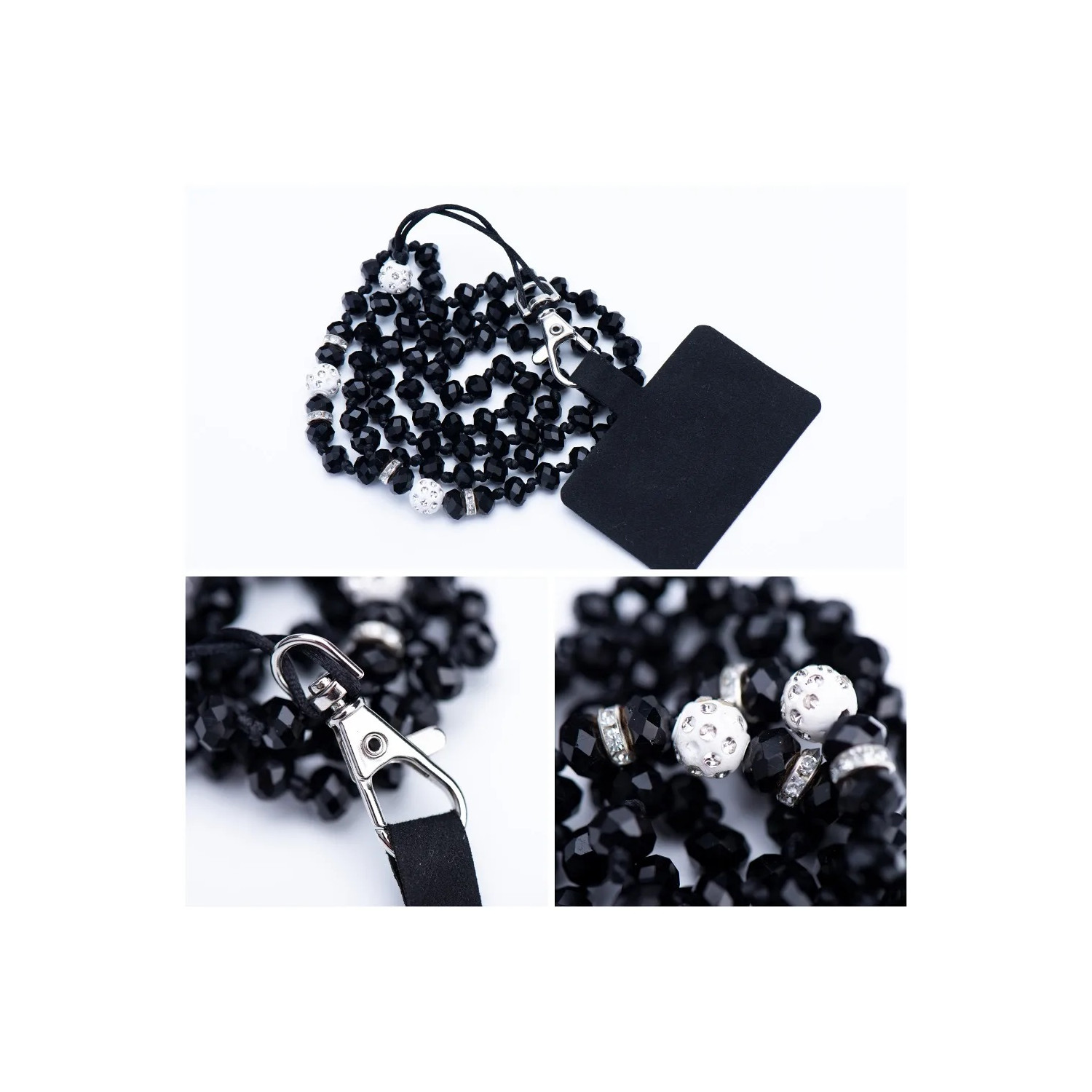 Primo piano di collana di perline nere con chiusura argentata ed etichetta nera. Le perline sono piccole e rotonde.