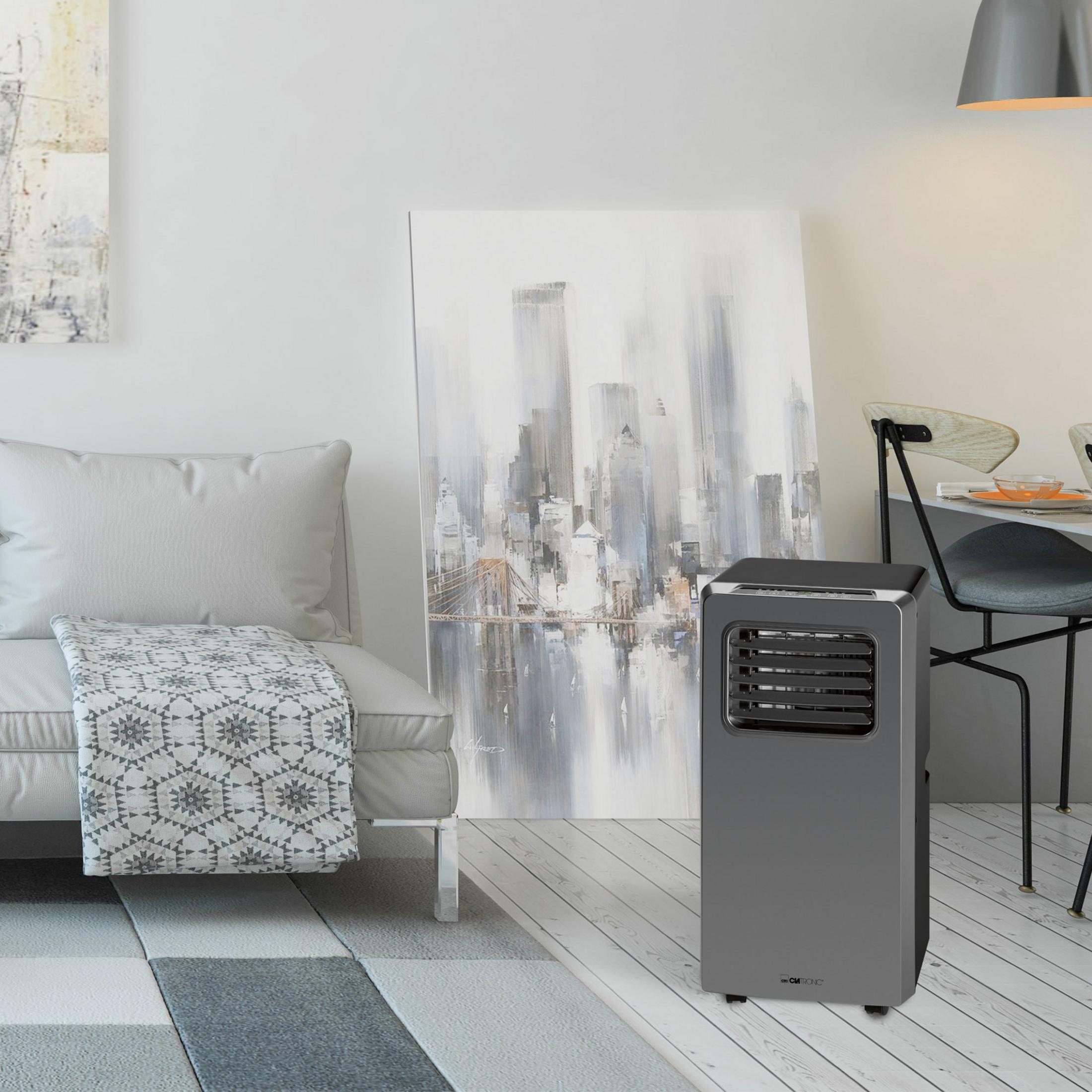 Salon z sofą, obrazem i klimatyzacją. Nowoczesny design.