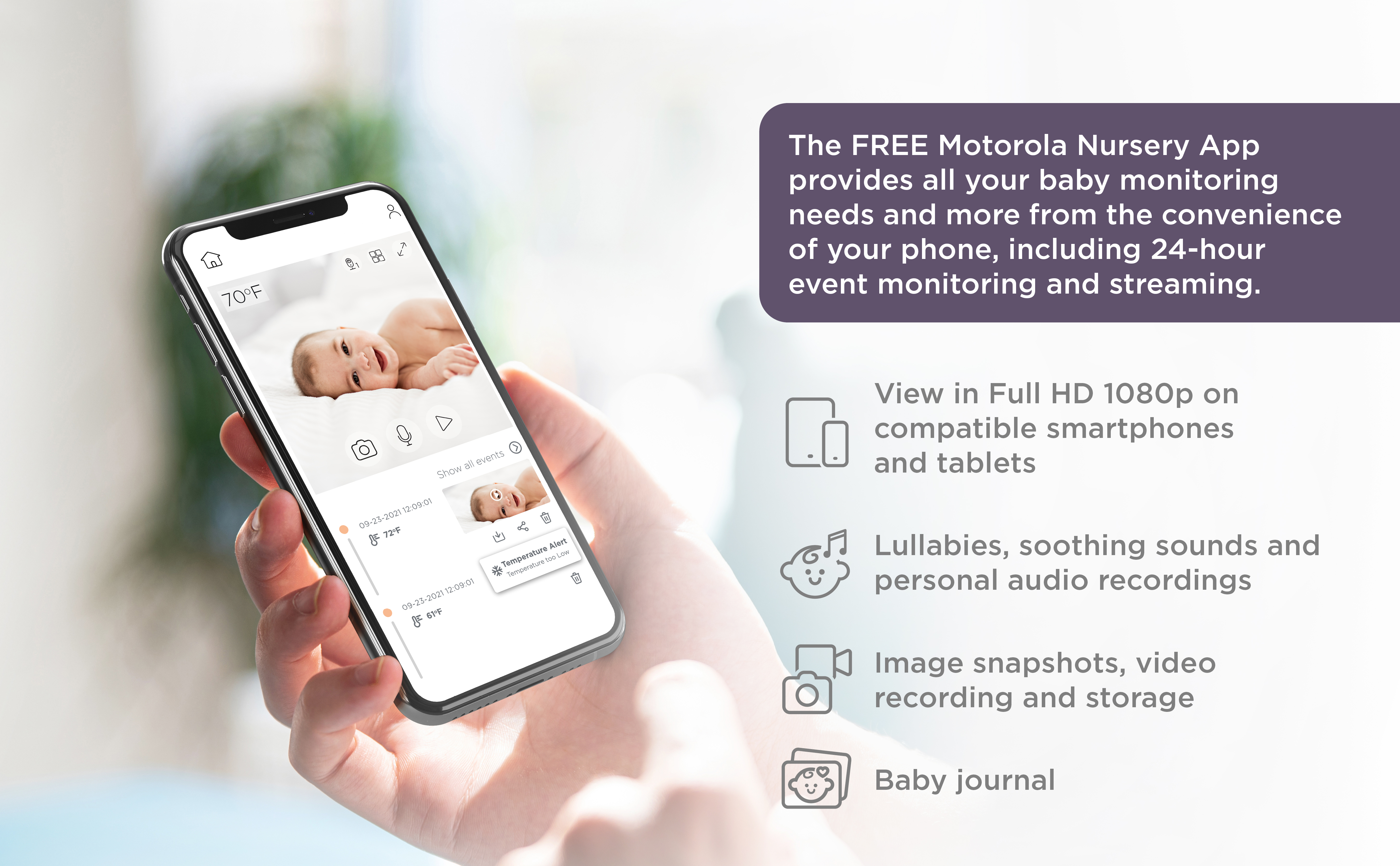 Eine Hand hält ein Smartphone, das eine Babyphone-App mit aufgelisteten Funktionen anzeigt.