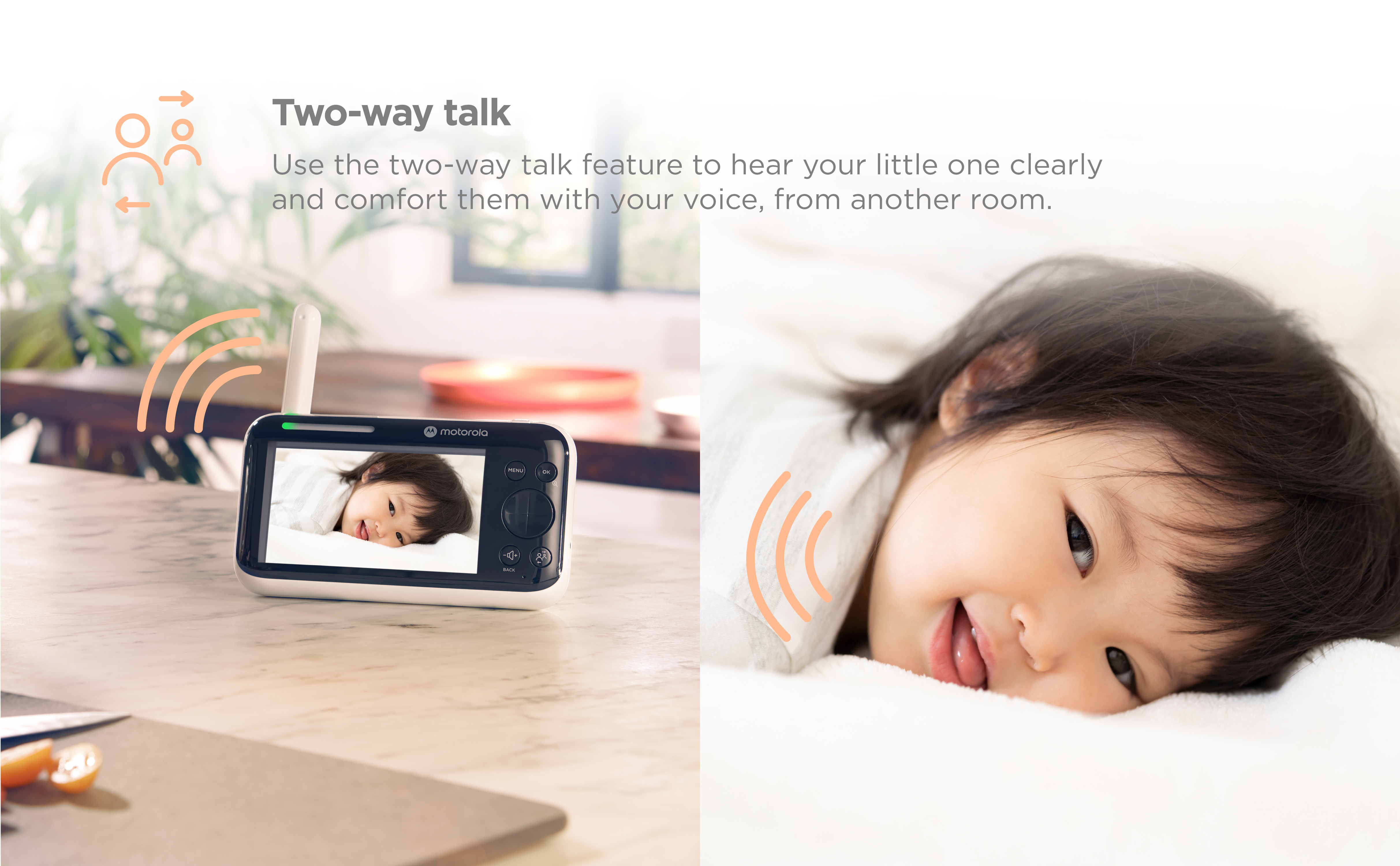 A baby monitor showing a baby, and a baby's face on the right, with sound waves.