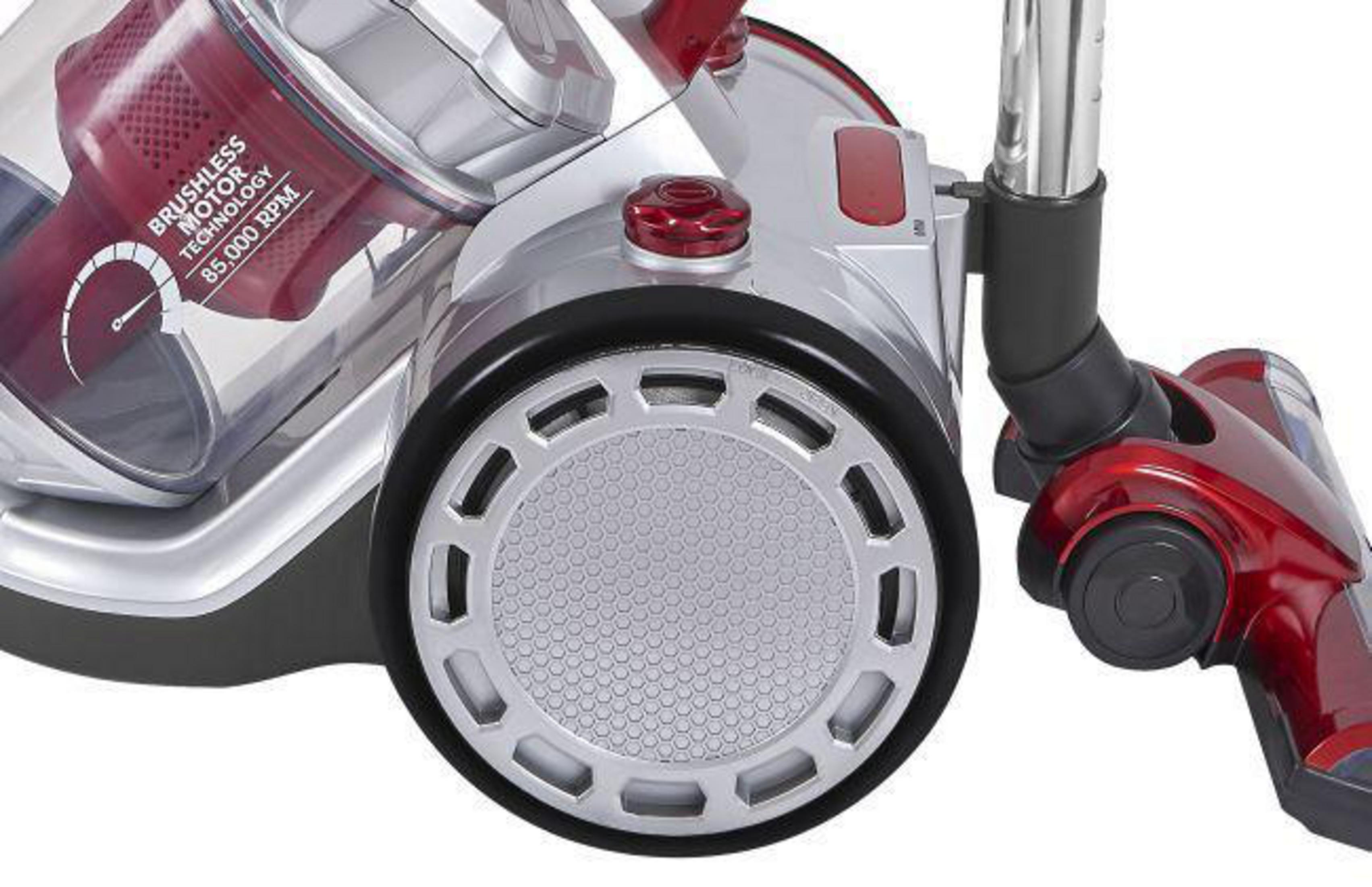 Nahaufnahme des Motors und Filters eines roten und silbernen Staubsaugers.