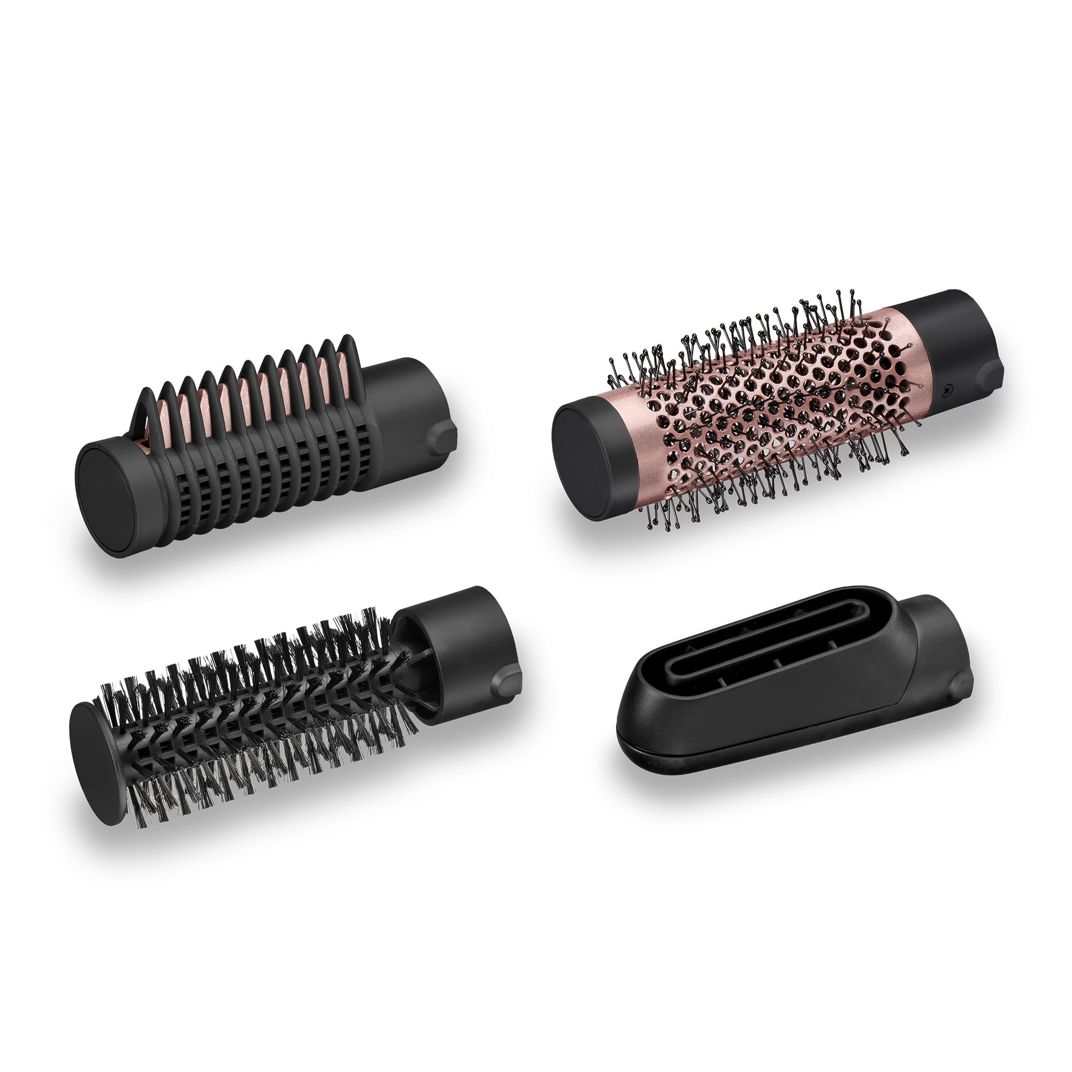Cztery nasadki do suszarki do włosów, w tym szczotki i dysza, na białym tle.