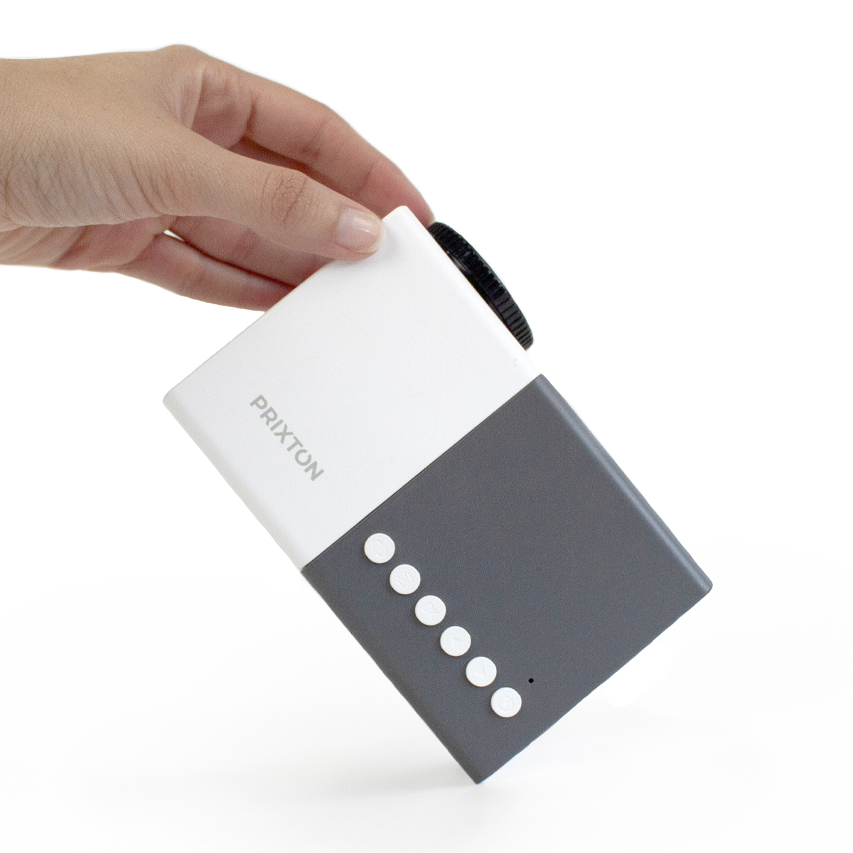 A hand holding a white and grey mini projector. Text: PRIXTON. Buttons on the grey part.