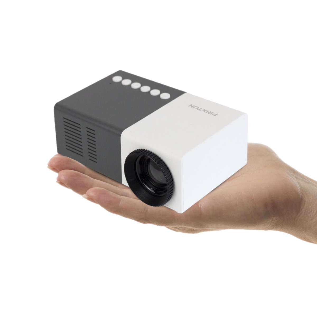 A small black and white projector held in a hand.