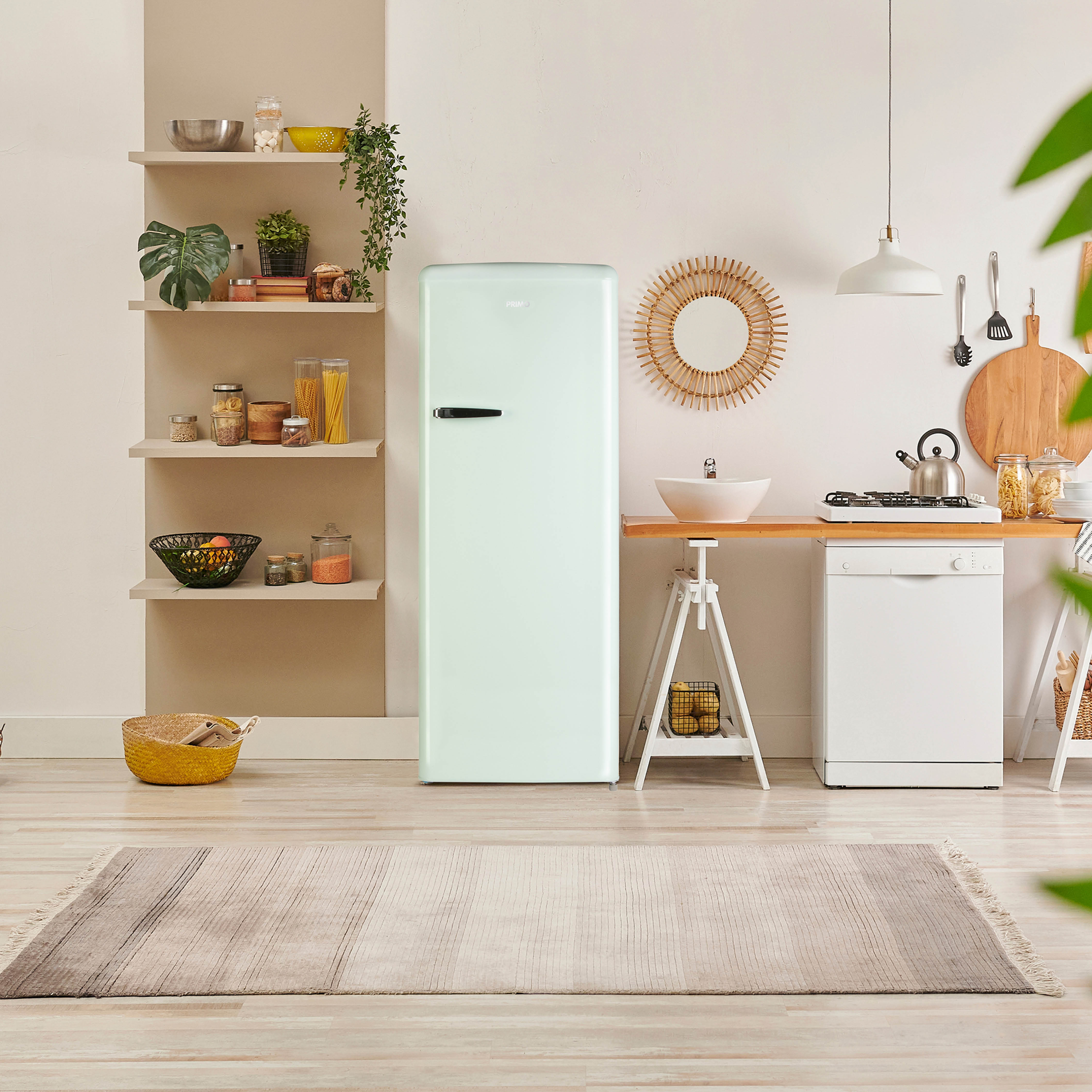 Une cuisine moderne avec un réfrigérateur vert clair, des étagères avec des objets et un comptoir en bois.