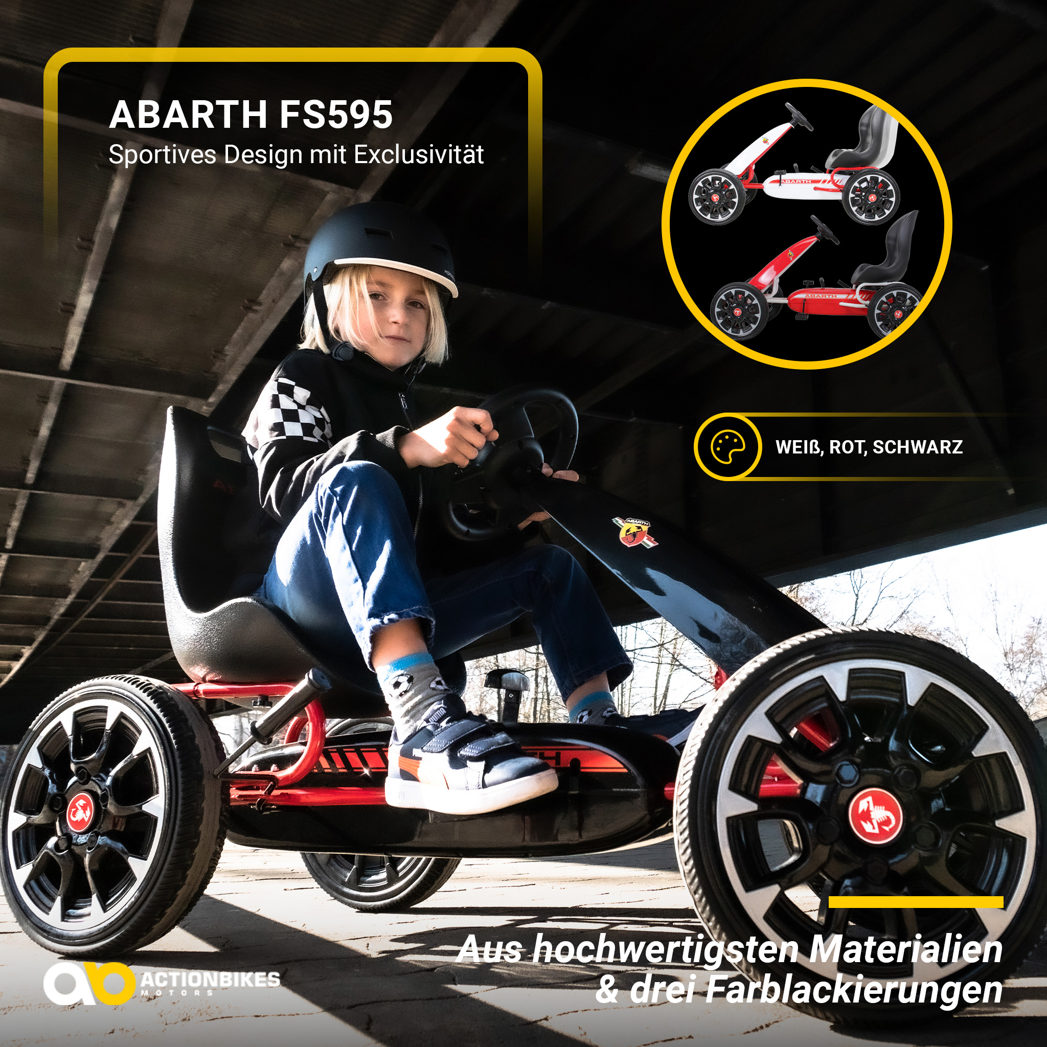 Kind auf einem schwarzen Go-Kart. Der Kart hat rote Akzente, schwarze Räder, und ist auf einer Brücke.