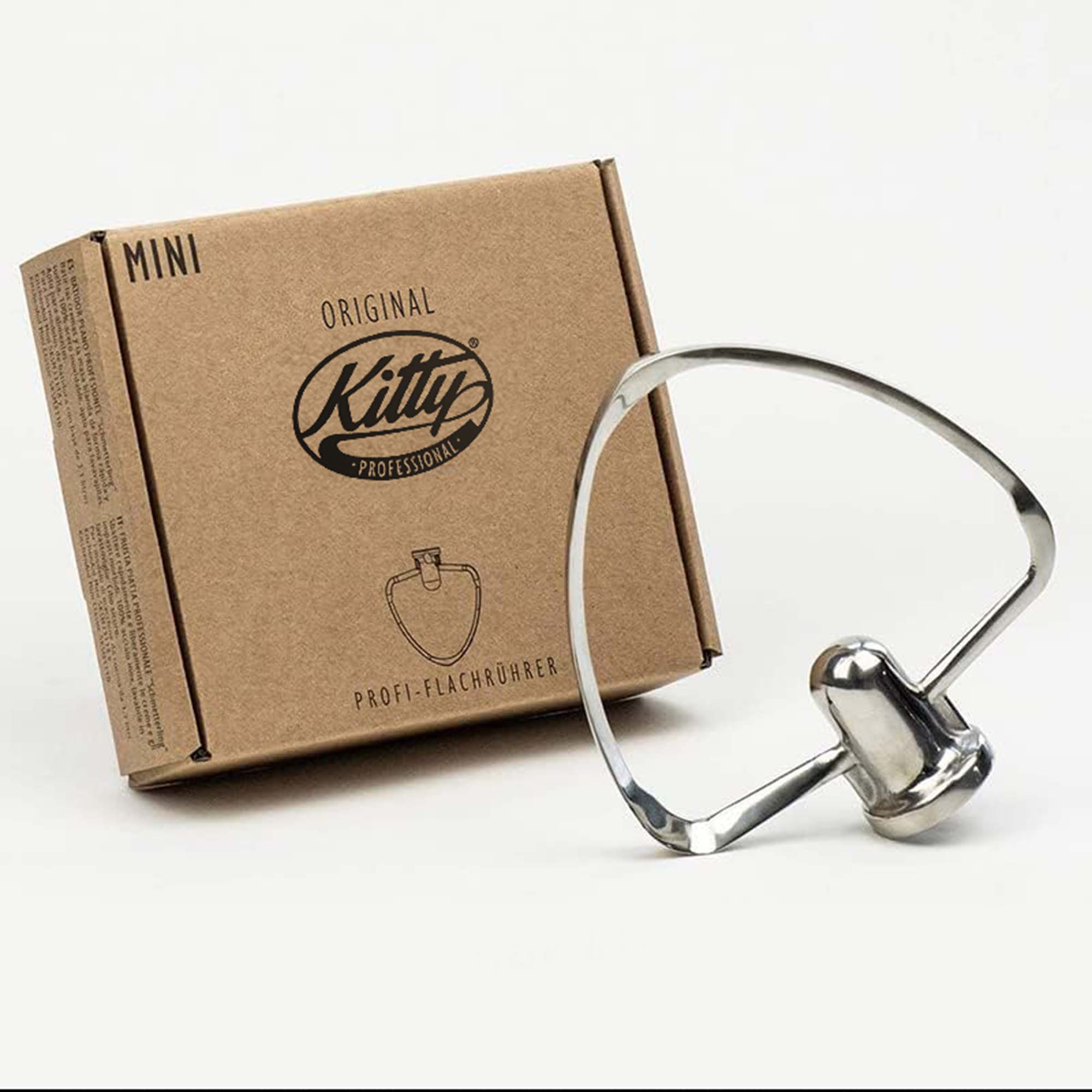 Eine Schachtel mit einem Mixer. Die Schachtel trägt die Aufschrift "Kitty Professional". Der Mixer ist silbern.