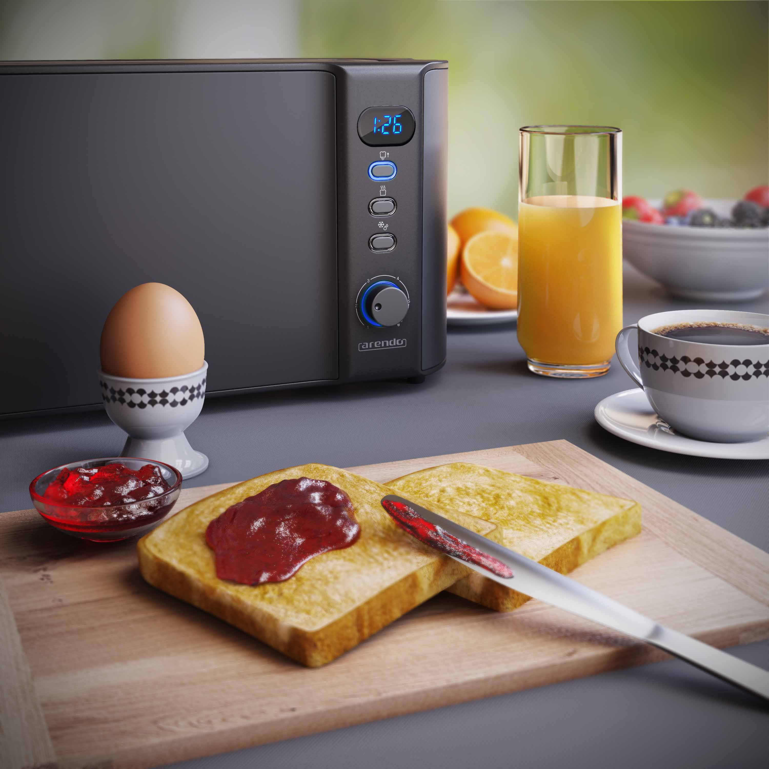 Frühstück: Toast mit Marmelade, Ei im Halter, Orangensaft, Kaffee. Toaster im Hintergrund.