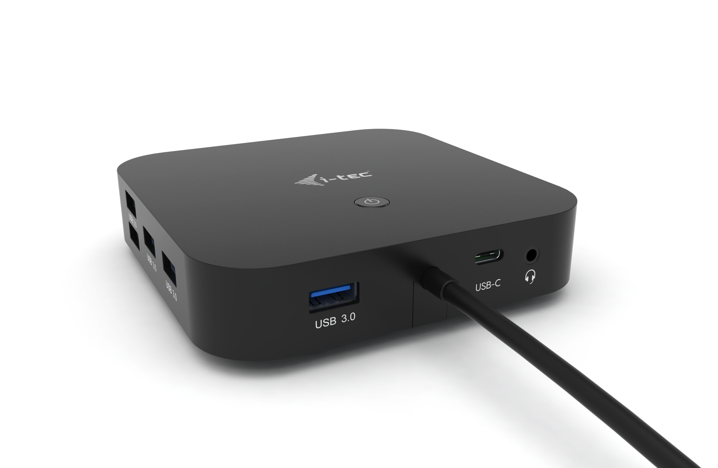 A black USB hub with multiple ports and a USB-C cable connected to it.