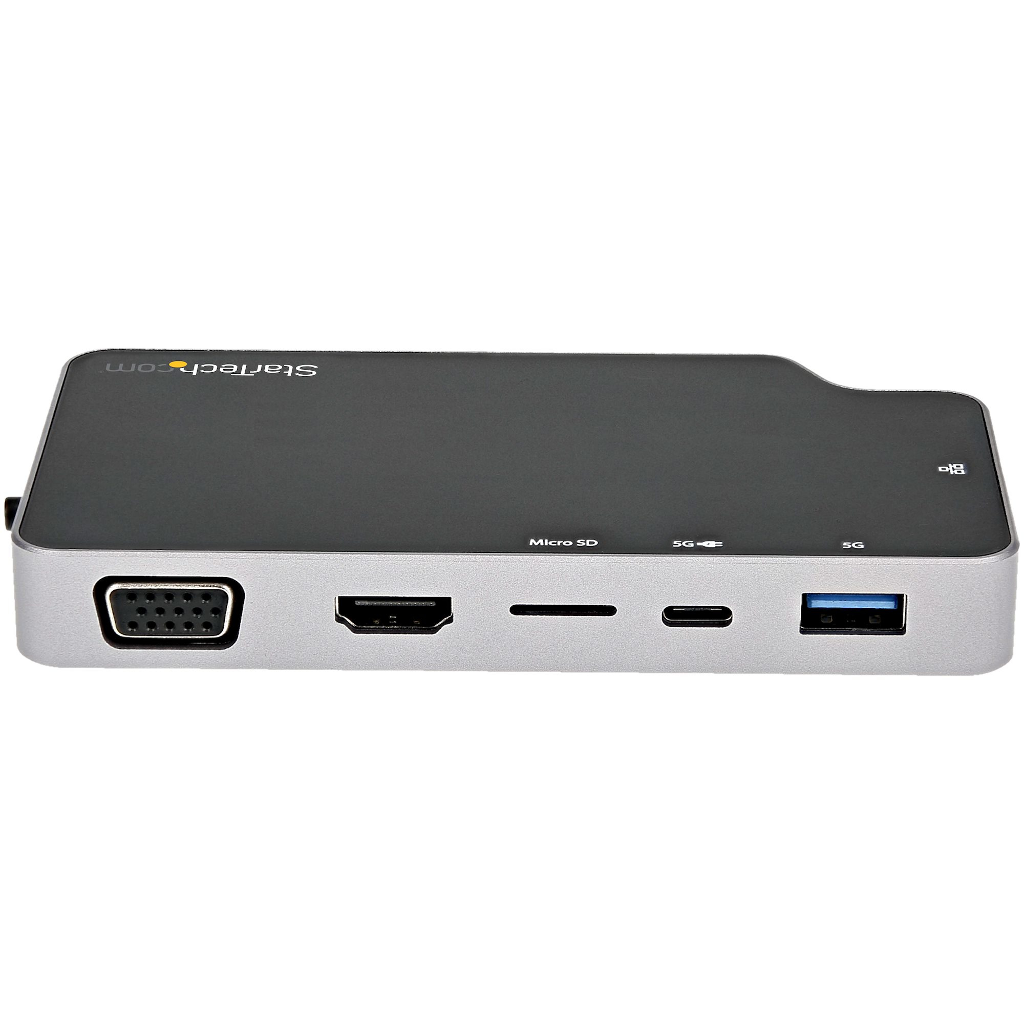 Ein silberner Multi-Port-Adapter mit verschiedenen Anschlüssen: VGA, HDMI, USB und Micro SD.