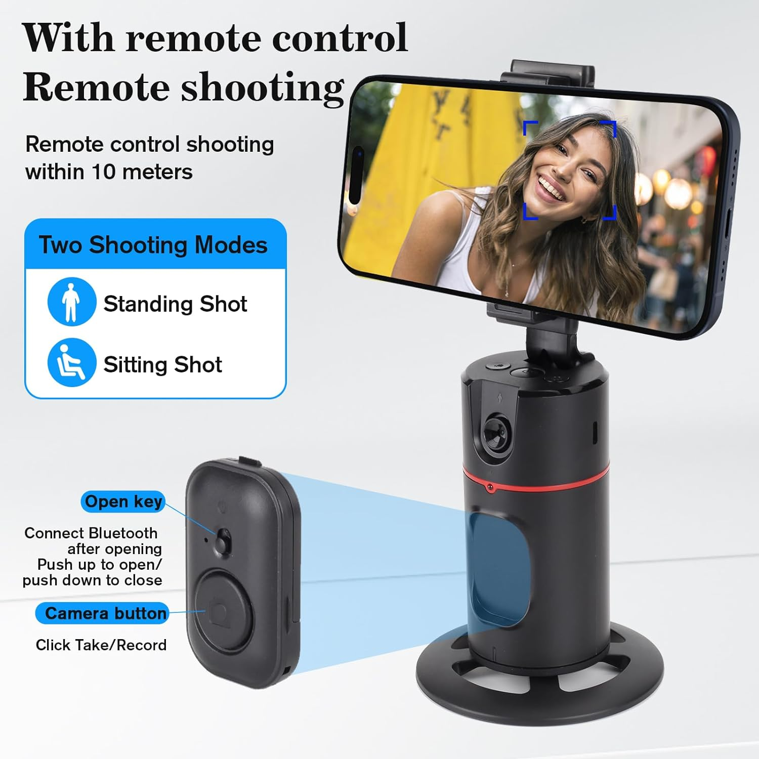 Ein Telefon in einer Halterung ist an einem schwarzen Stab befestigt, daneben eine Fernbedienung.