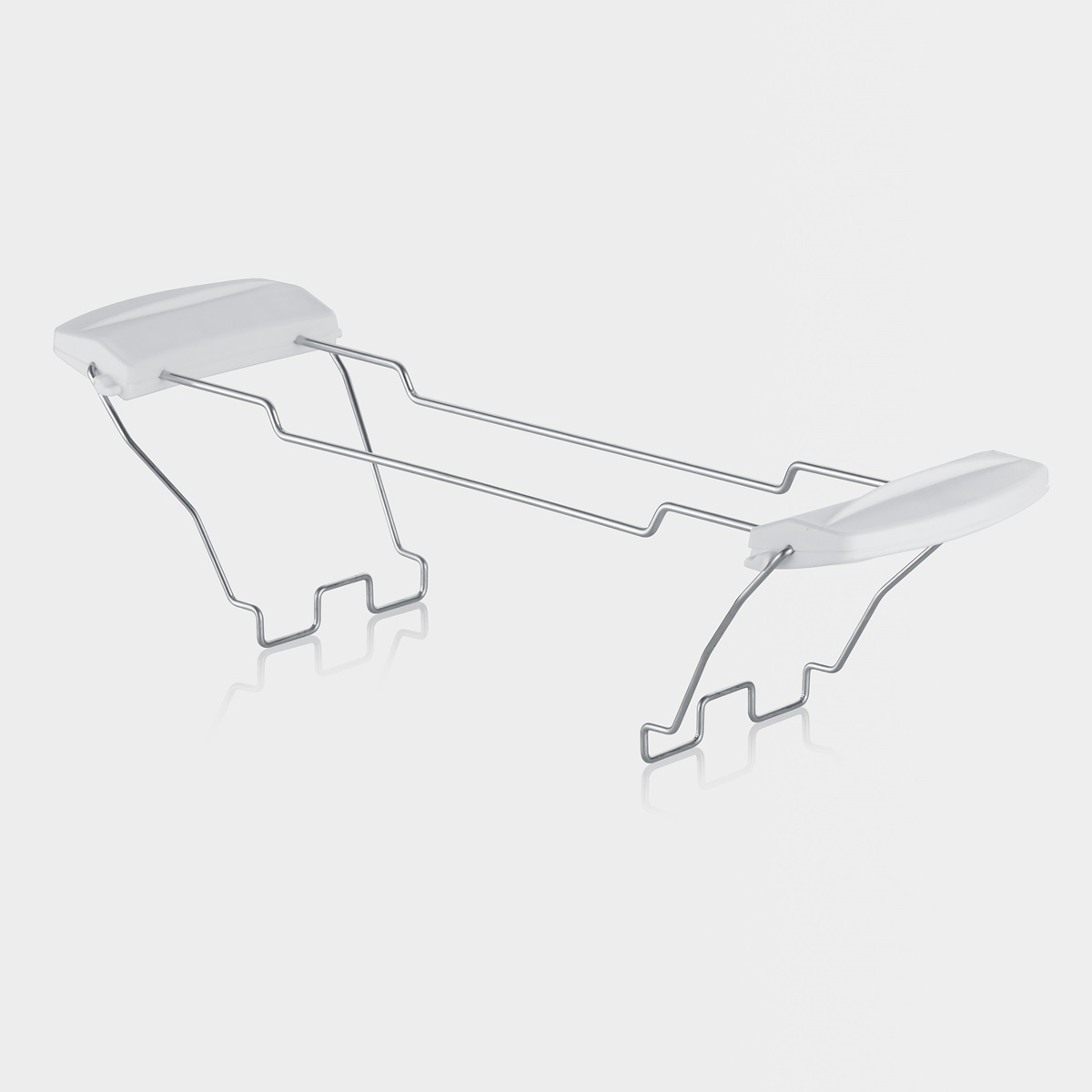 Srebrny metalowy wspornik z białymi plastikowymi końcami, do nieznanego celu.